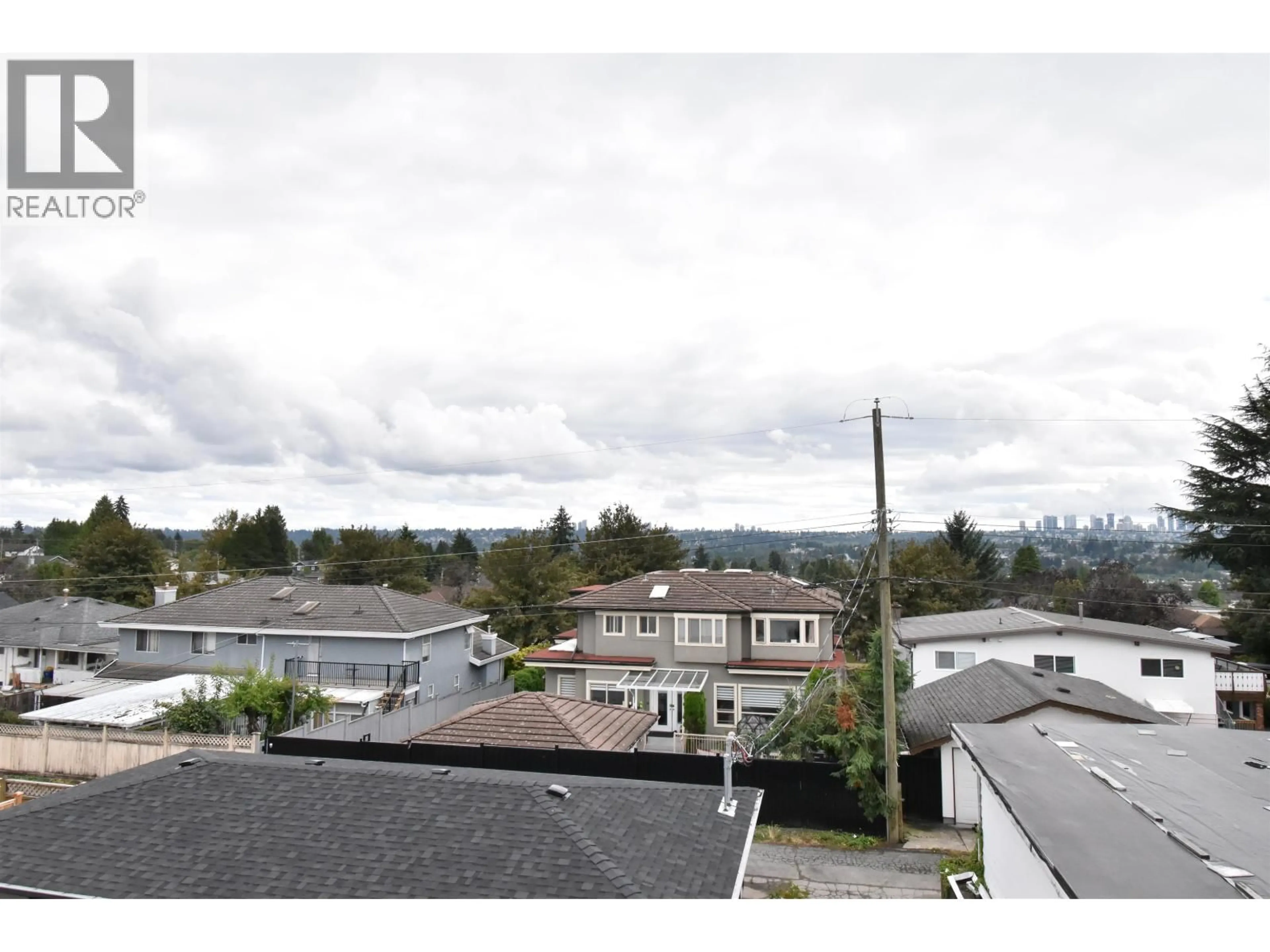 A pic from outside/outdoor area/front of a property/back of a property/a pic from drone, mountain view for 6250 KITCHENER STREET, Burnaby British Columbia V5B2J4