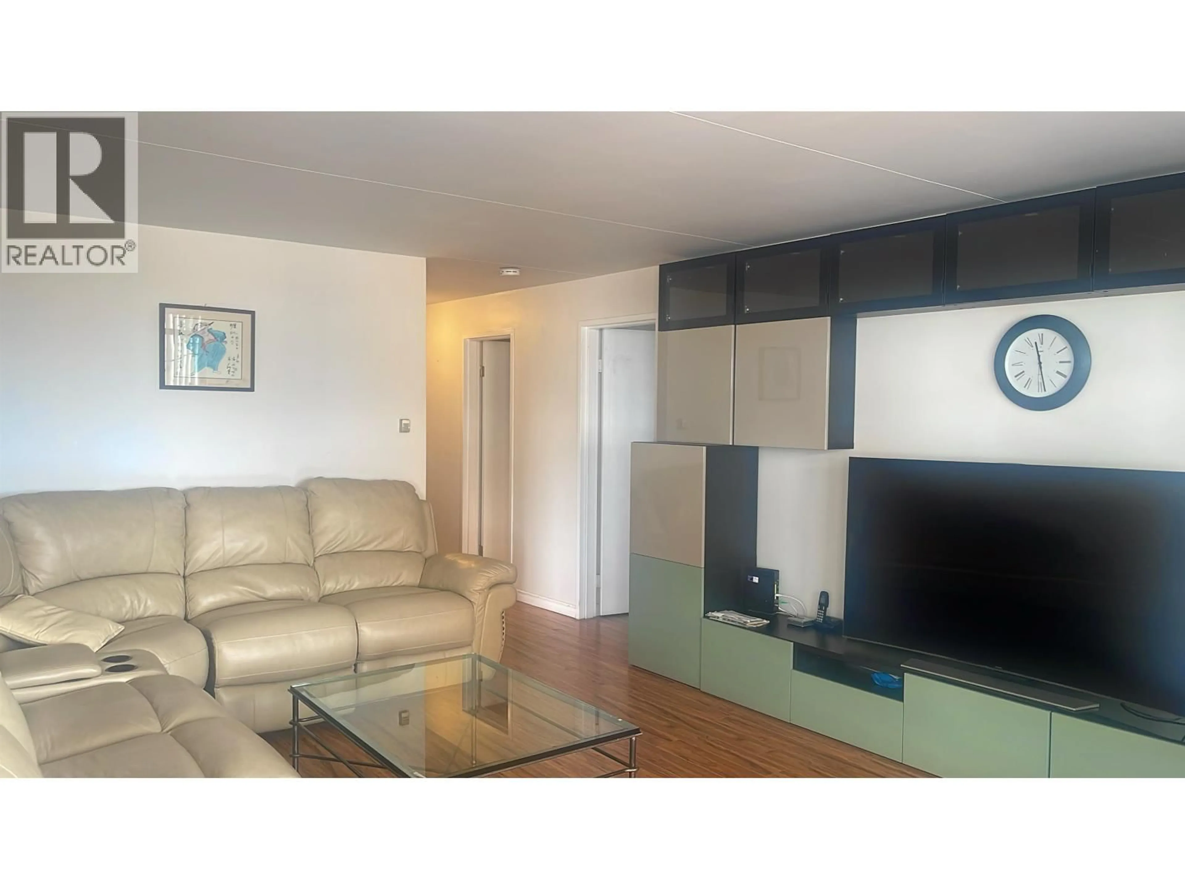 Living room with furniture, wood/laminate floor for 704 - 6651 MINORU BOULEVARD, Richmond British Columbia V6Y1Z2