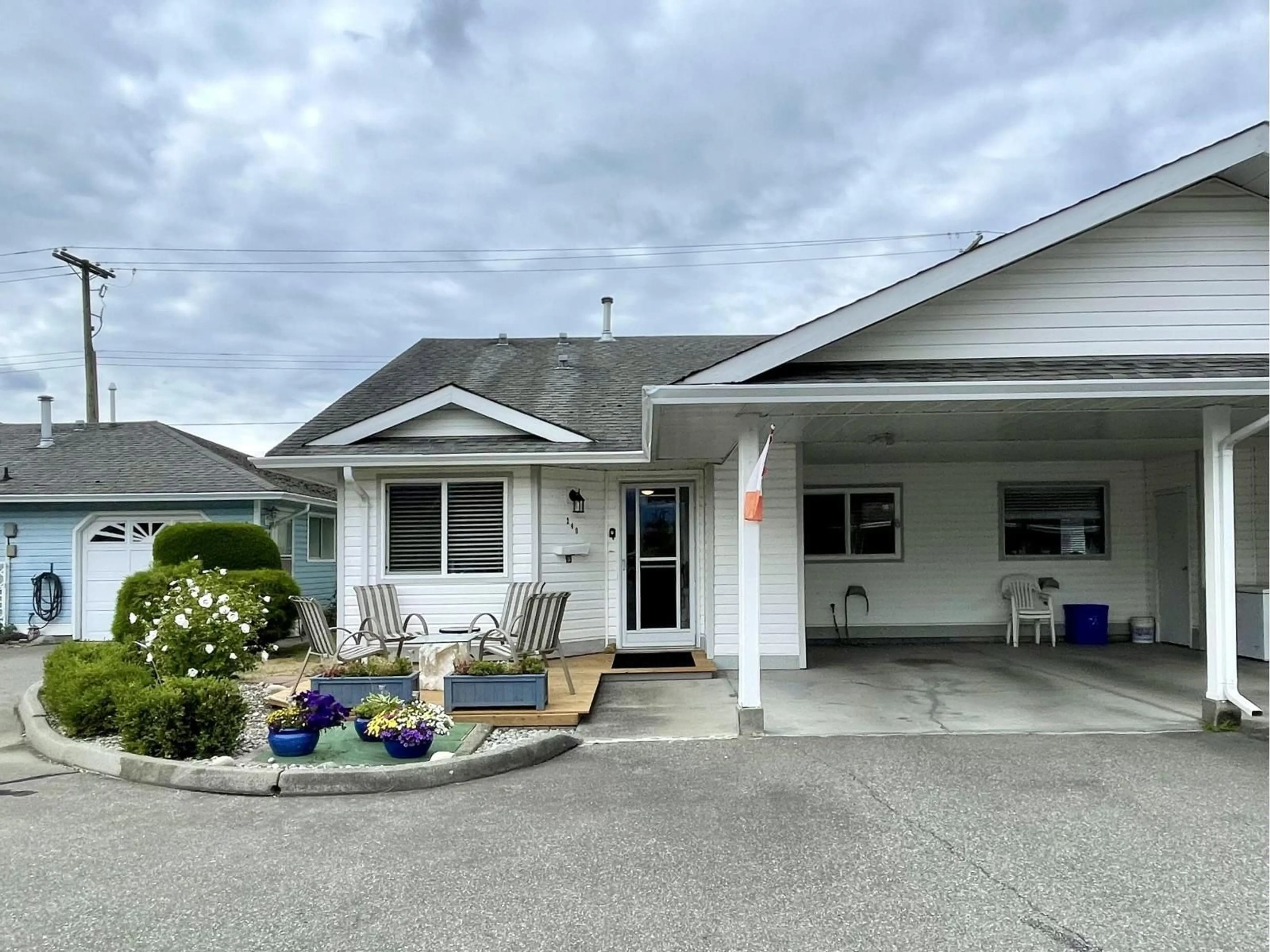 A pic from outside/outdoor area/front of a property/back of a property/a pic from drone, unknown for 240 - 7610 EVANS ROAD, Chilliwack British Columbia V2R2Z5