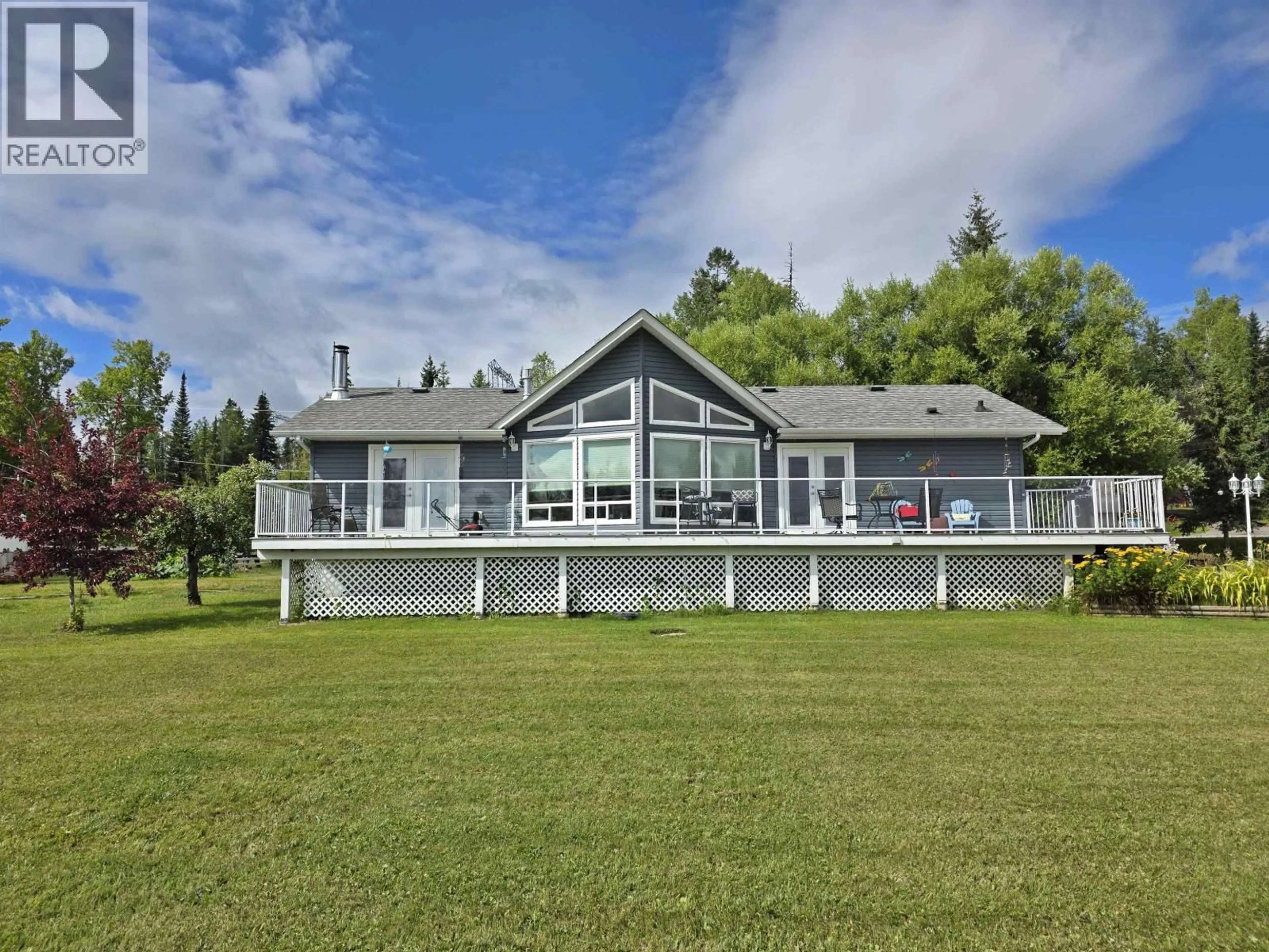 A pic from outside/outdoor area/front of a property/back of a property/a pic from drone, water/lake/river/ocean view for 4812 TEN MILE LAKE ROAD, Quesnel British Columbia V2J6X1