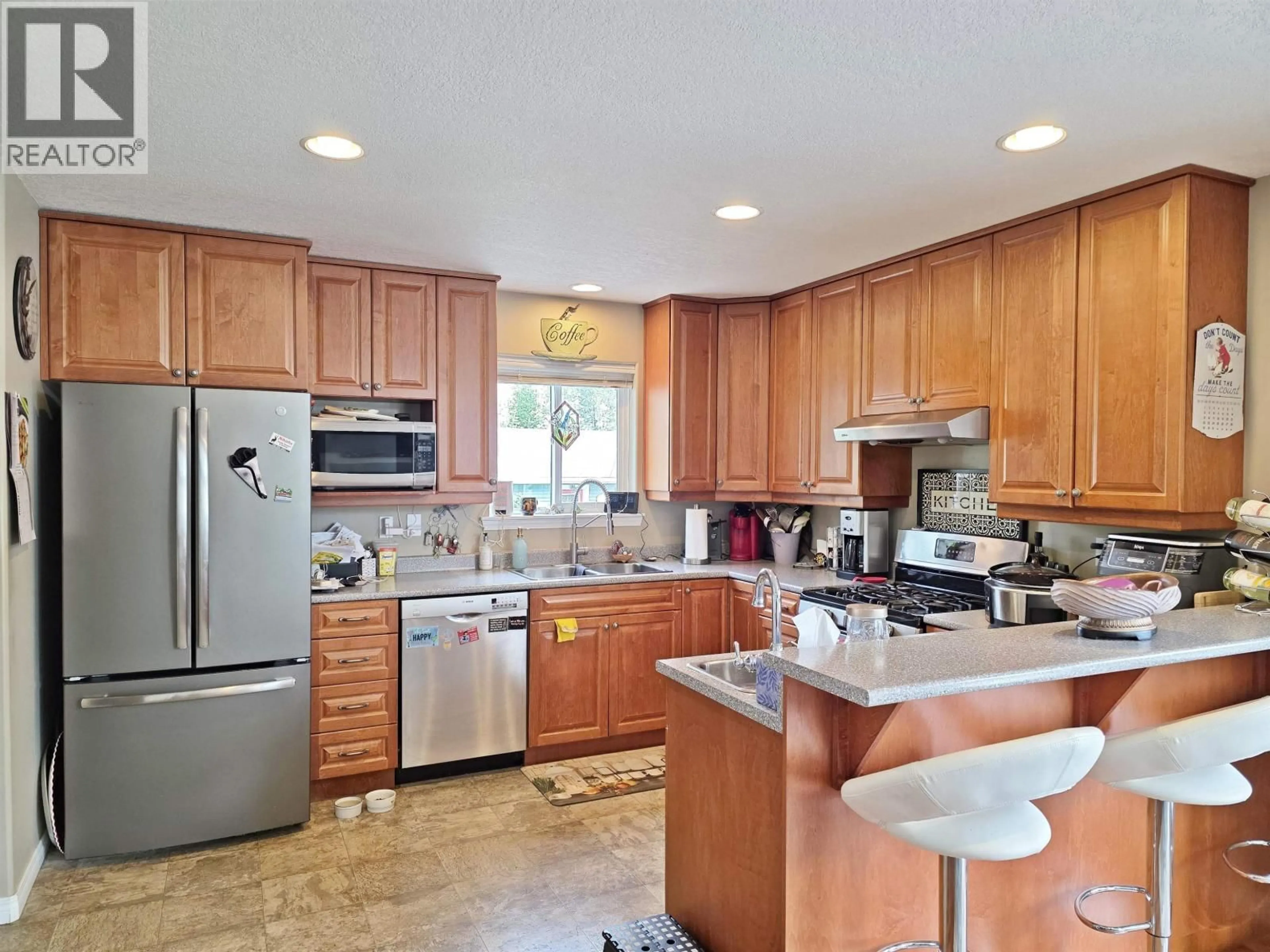 Open concept kitchen, ceramic/tile floor for 4812 TEN MILE LAKE ROAD, Quesnel British Columbia V2J6X1