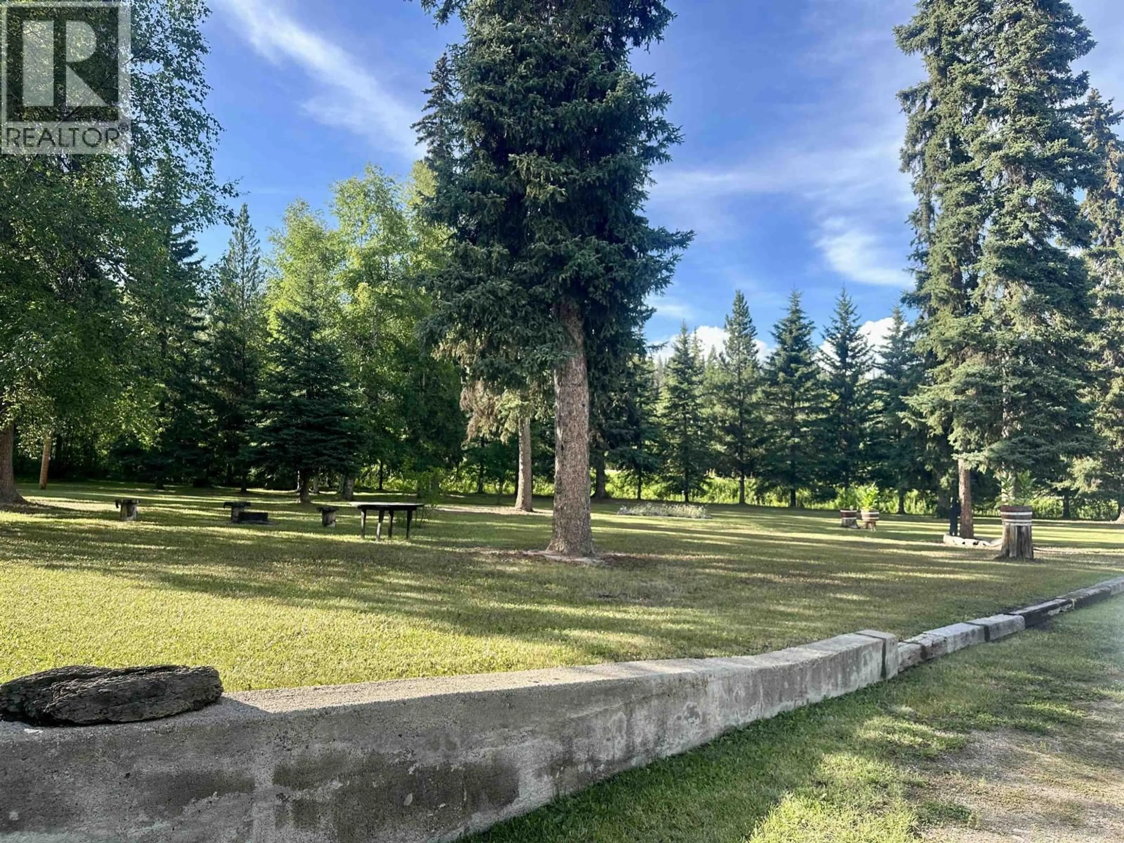 Patio, forest/trees view for 705 FRANCOIS LAKE ROAD, Fraser Lake British Columbia V0J1S0