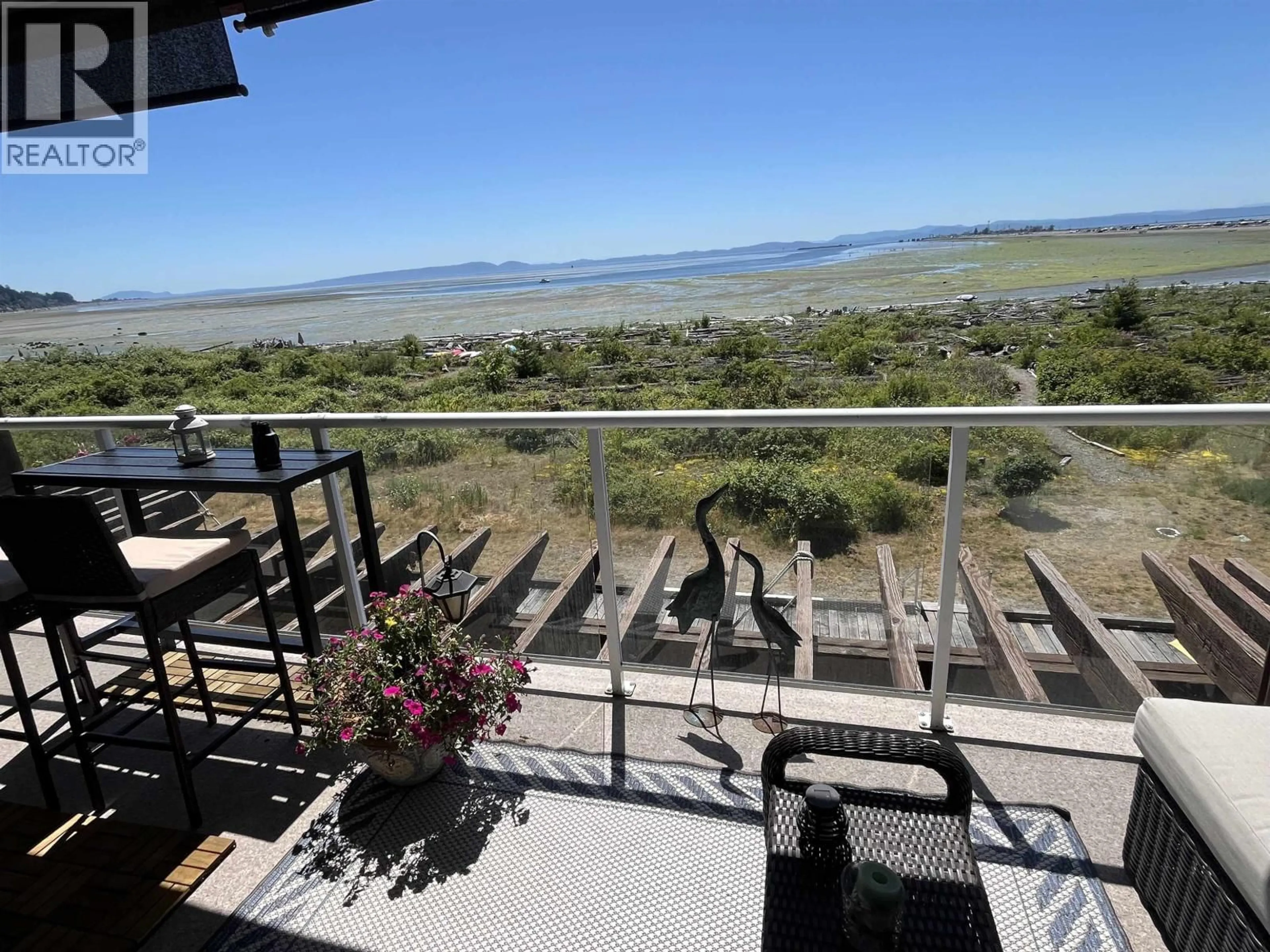 Patio, water/lake/river/ocean view for 207 - 1120 TSATSU SHORES DRIVE, Tsawwassen British Columbia V4M4G3