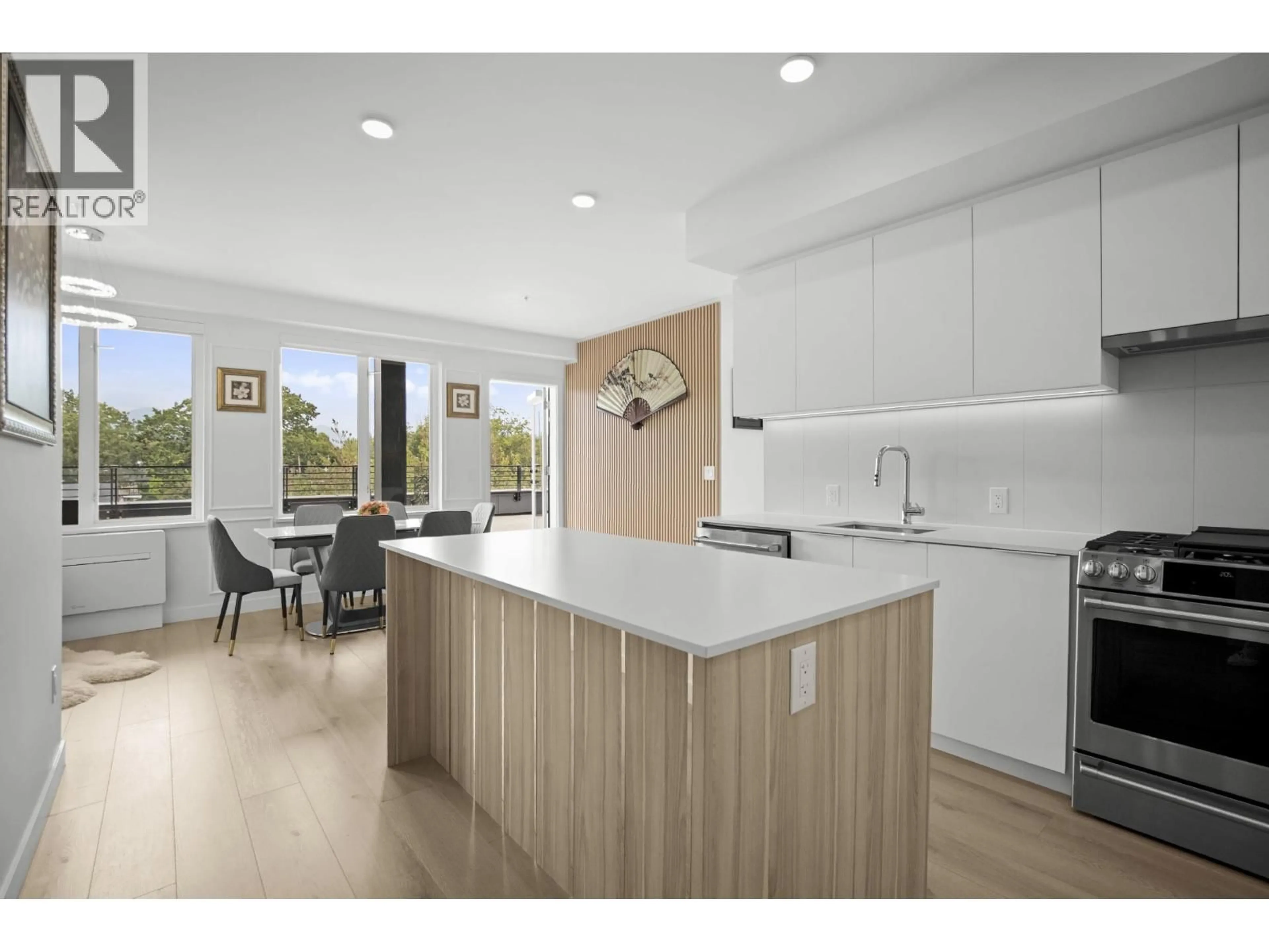 Open concept kitchen, unknown for 505 - 2450 GARDEN DRIVE, Vancouver British Columbia V5N0K1