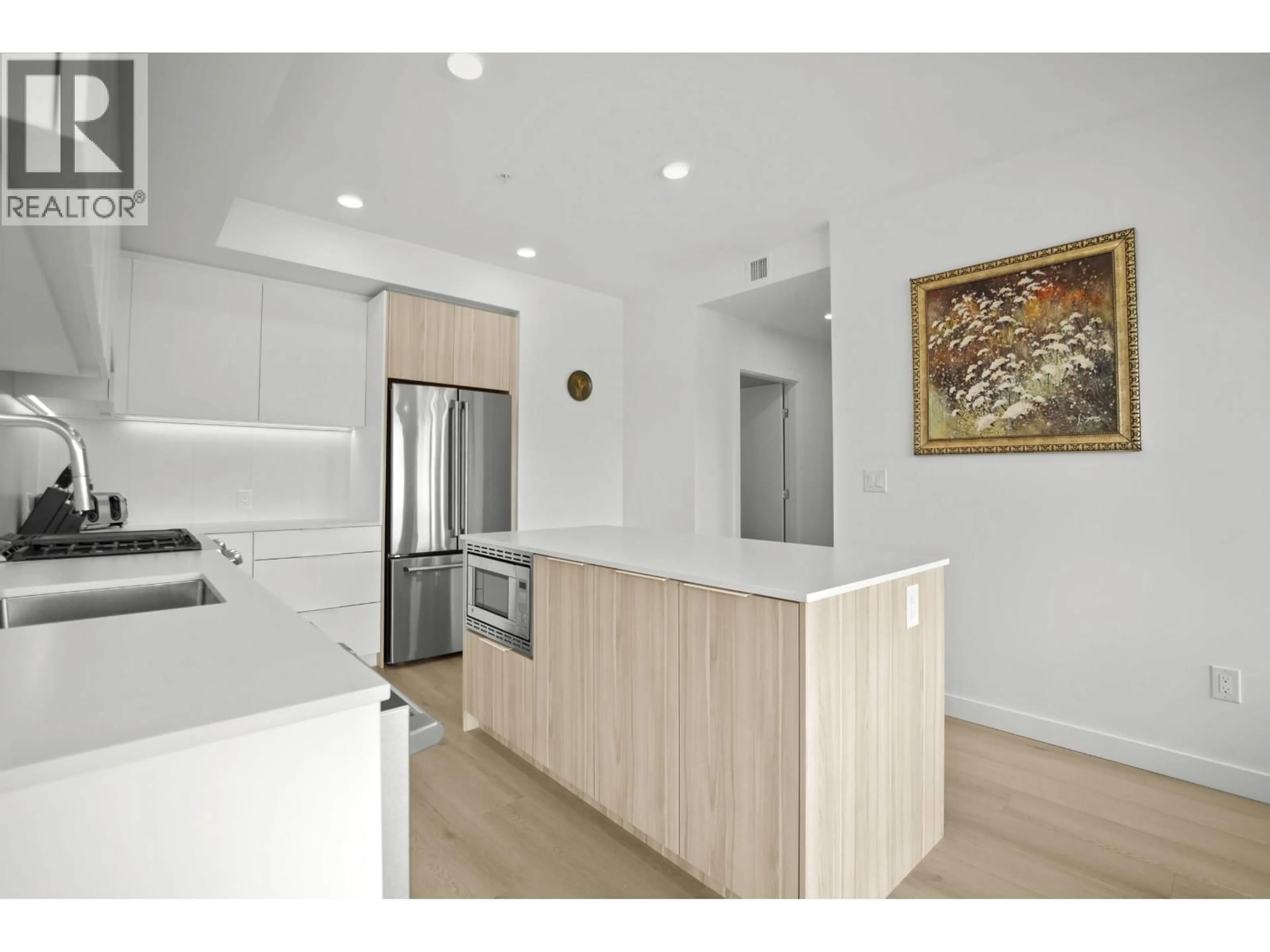 Open concept kitchen, unknown for 505 - 2450 GARDEN DRIVE, Vancouver British Columbia V5N0K1