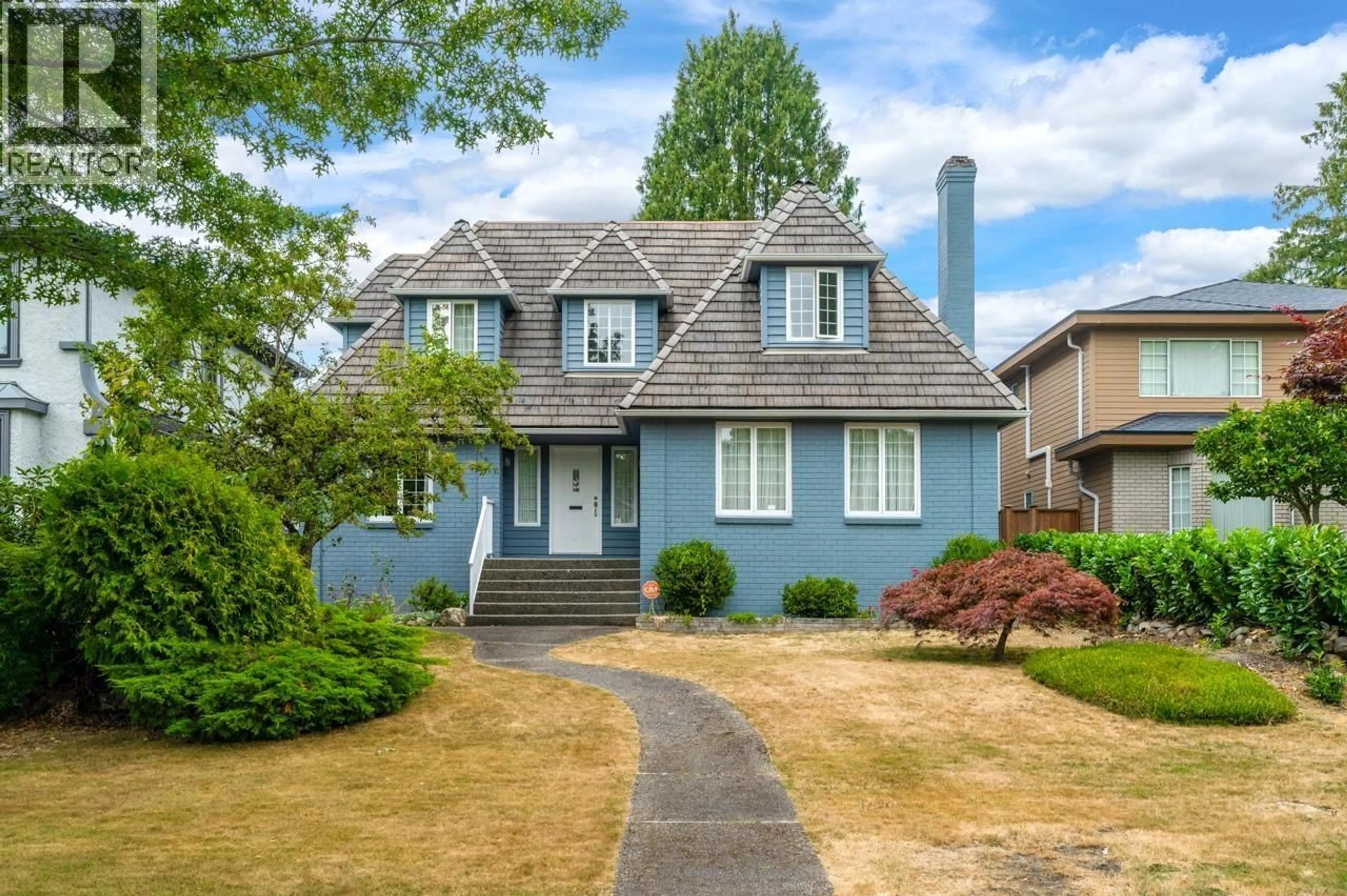 Home with vinyl exterior material, street for 1653 62ND AVENUE, Vancouver British Columbia V6P2G1