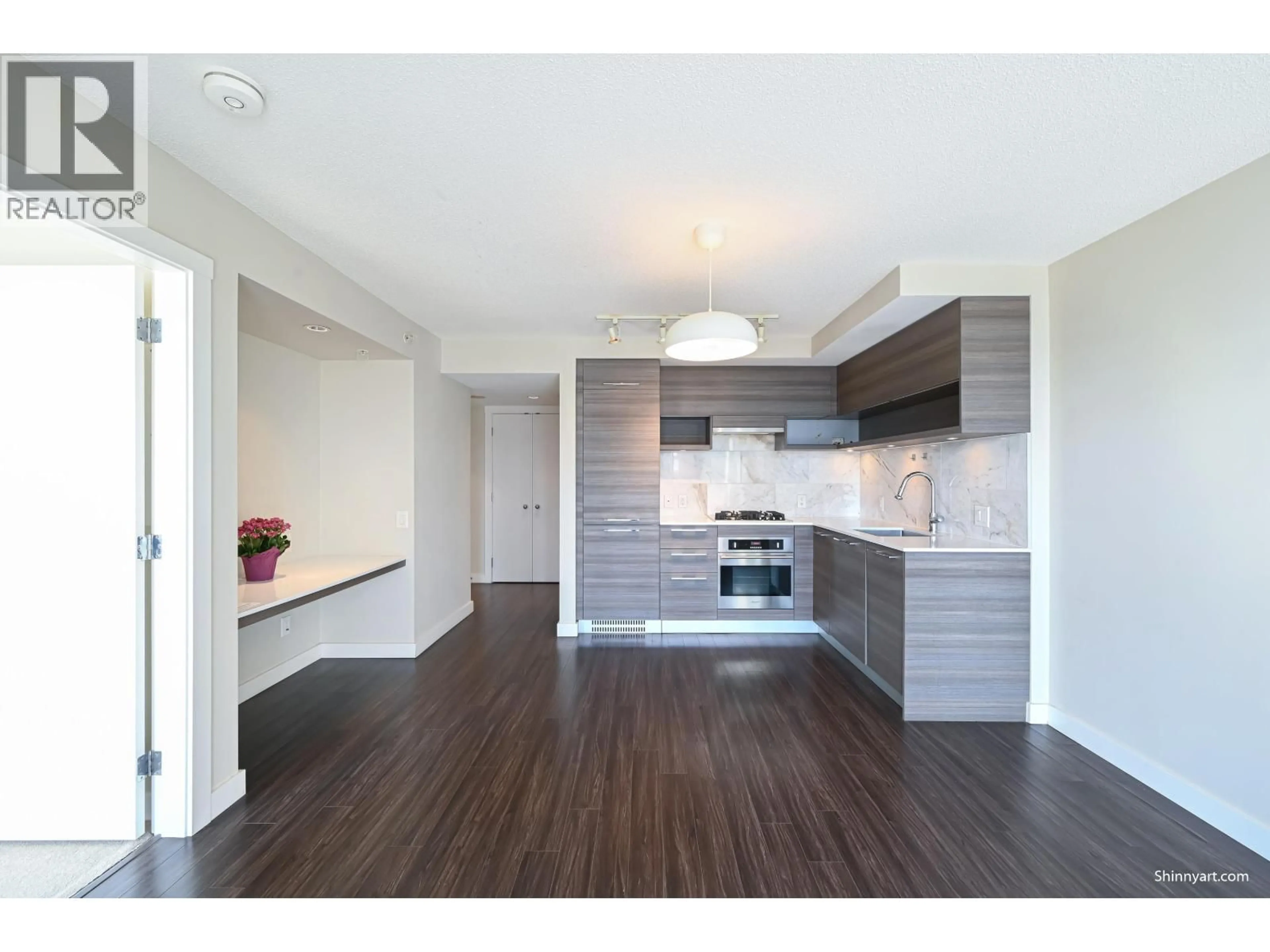 Open concept kitchen, wood/laminate floor for 601 - 570 EMERSON STREET, Coquitlam British Columbia V3J0G3
