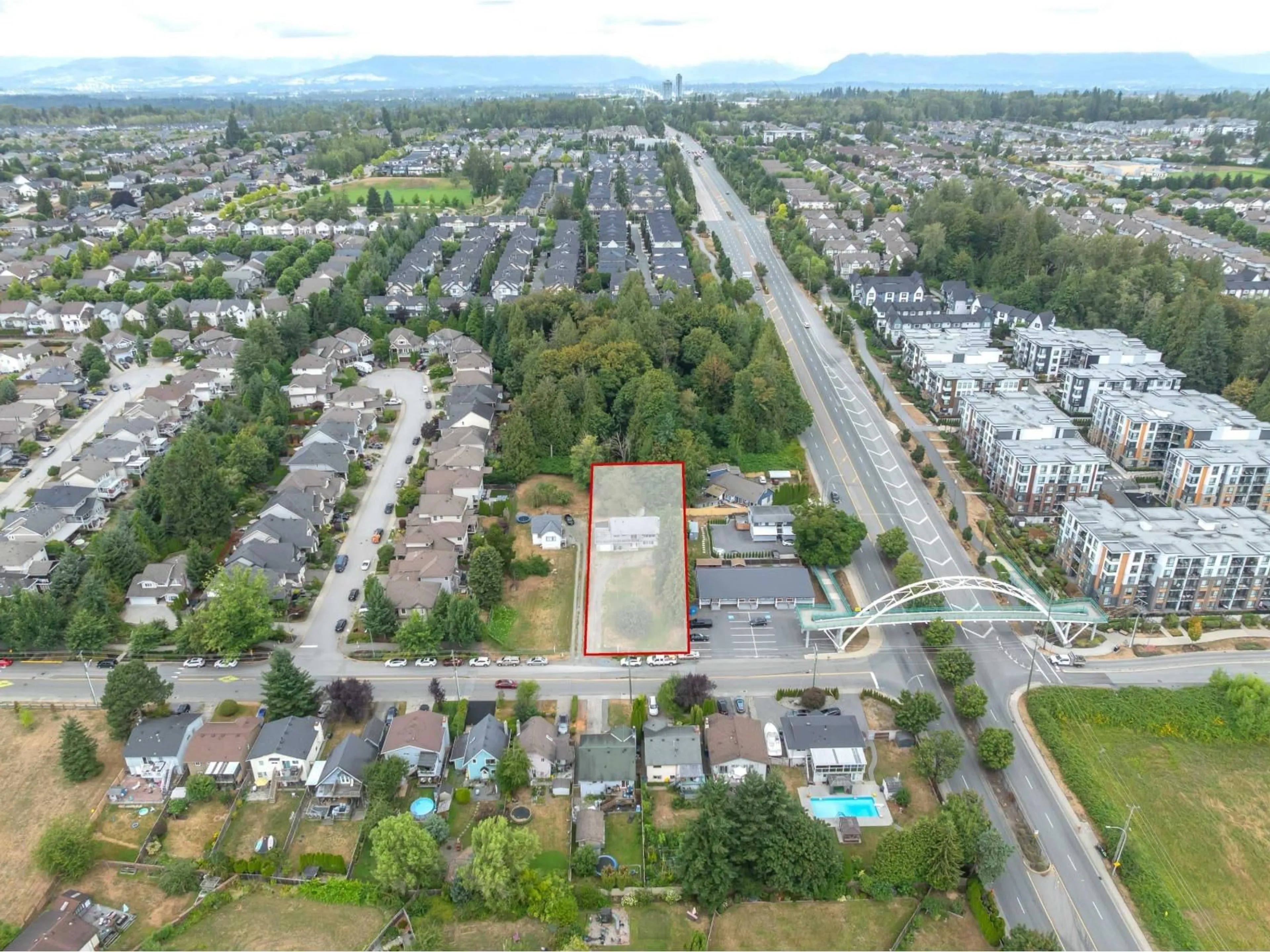 A pic from outside/outdoor area/front of a property/back of a property/a pic from drone, street for 19983 68, Langley British Columbia V2Y2W5