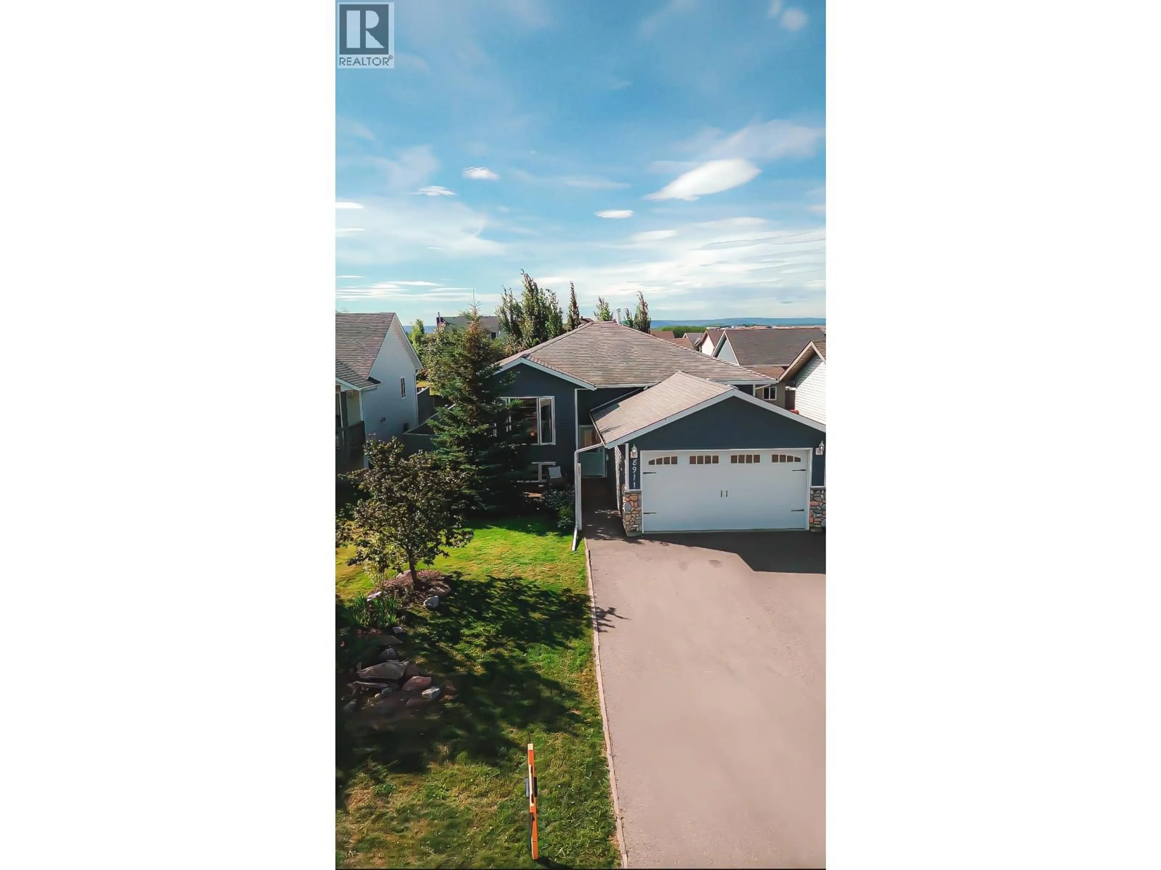 A pic from outside/outdoor area/front of a property/back of a property/a pic from drone, unknown for 8911 98 AVENUE, Fort St. John British Columbia V1J6Y7