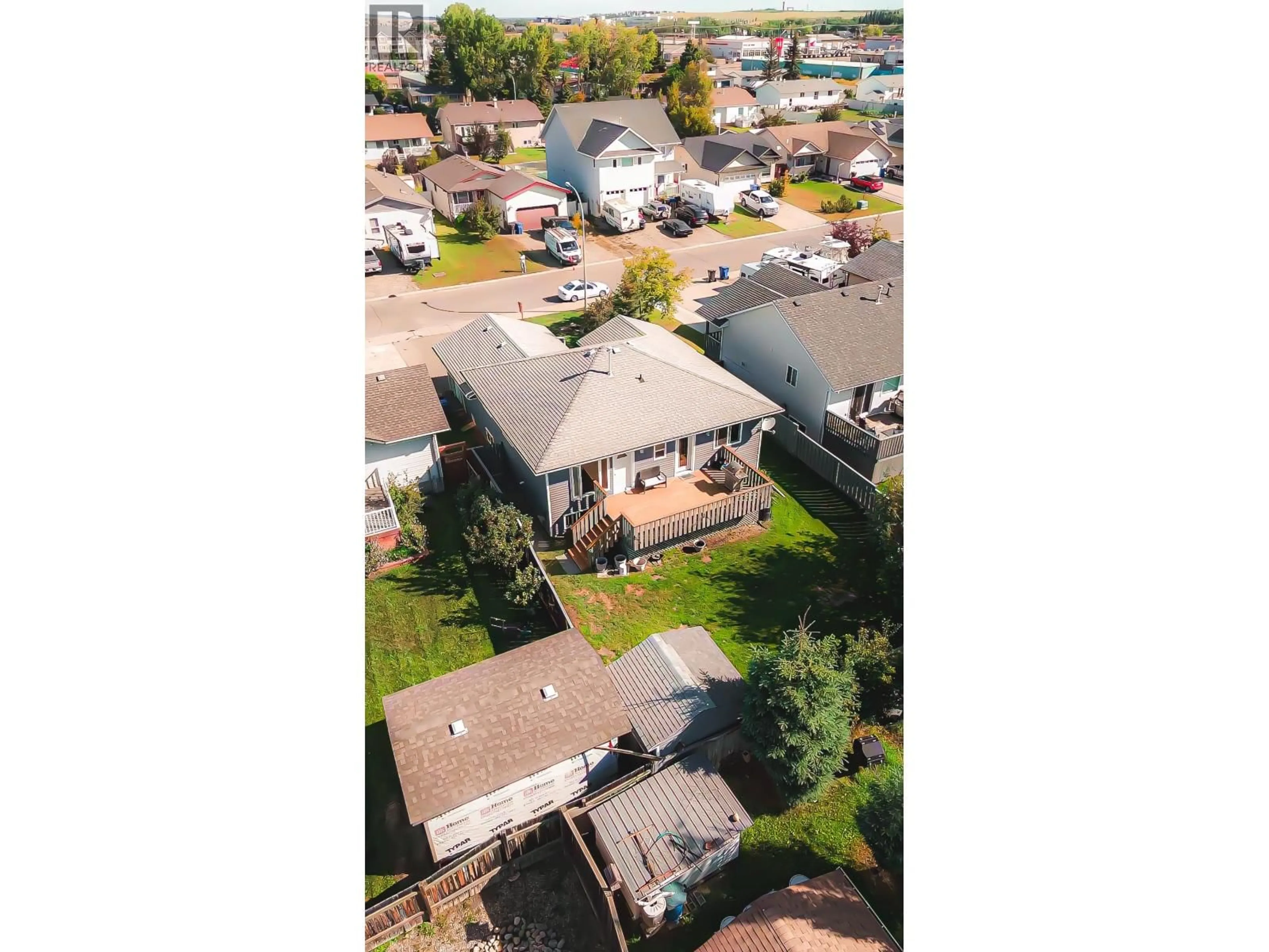 A pic from outside/outdoor area/front of a property/back of a property/a pic from drone, street for 8911 98 AVENUE, Fort St. John British Columbia V1J6Y7