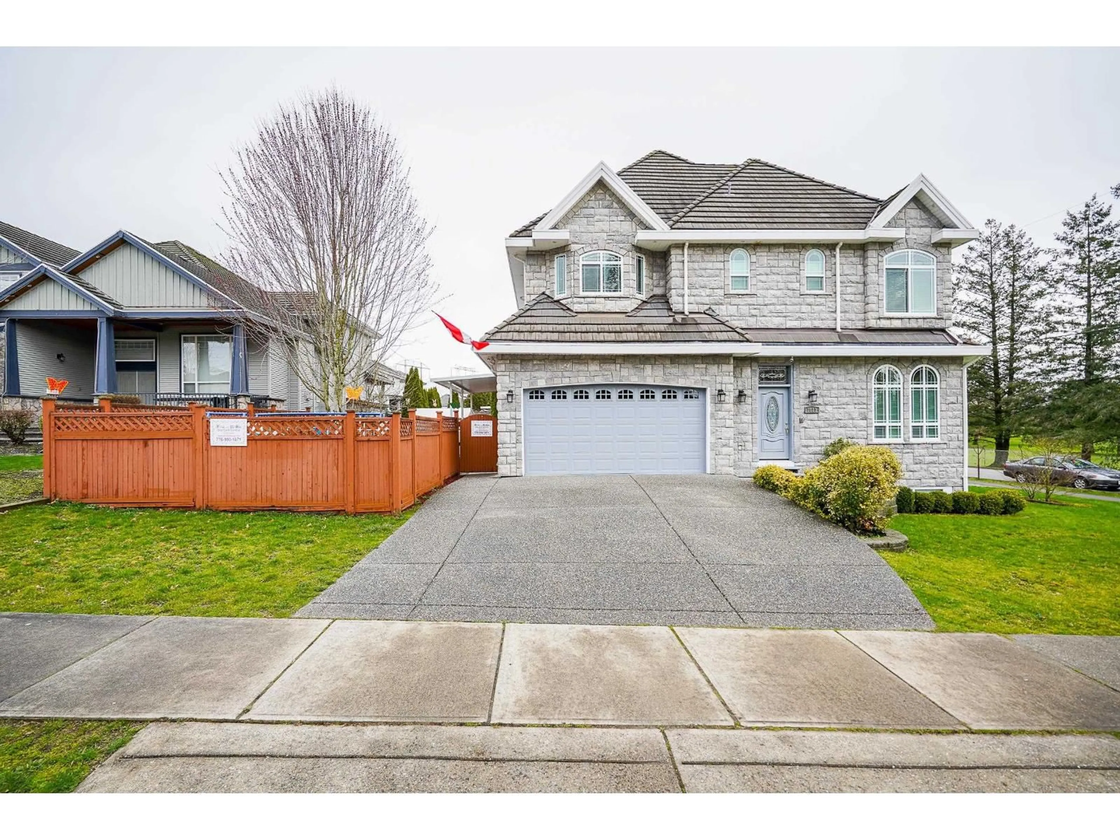 Home with vinyl exterior material, street for 7811 148, Surrey British Columbia V3S3G1