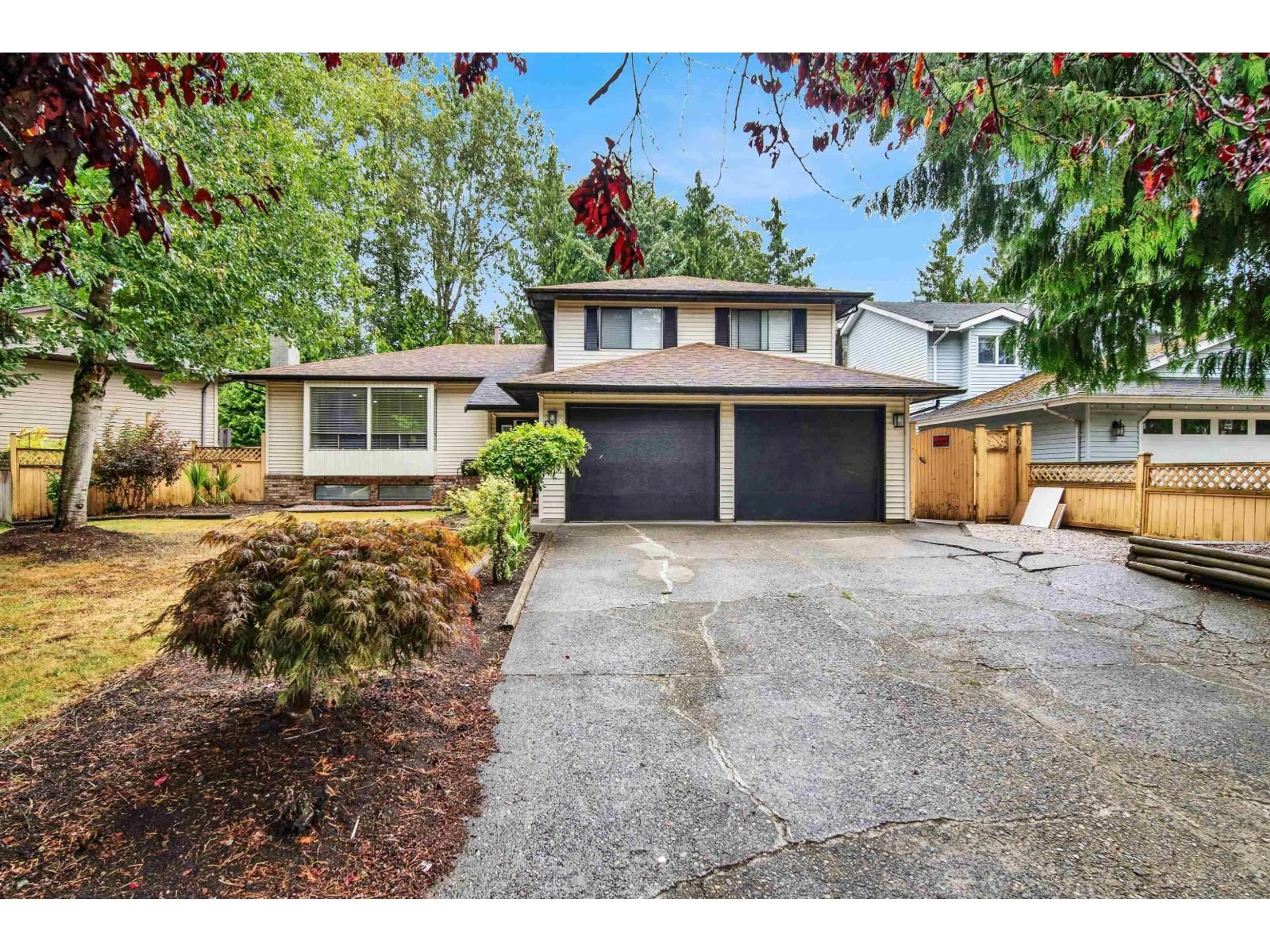 Home with vinyl exterior material, street for 6324 130B, Surrey British Columbia V3X1R4