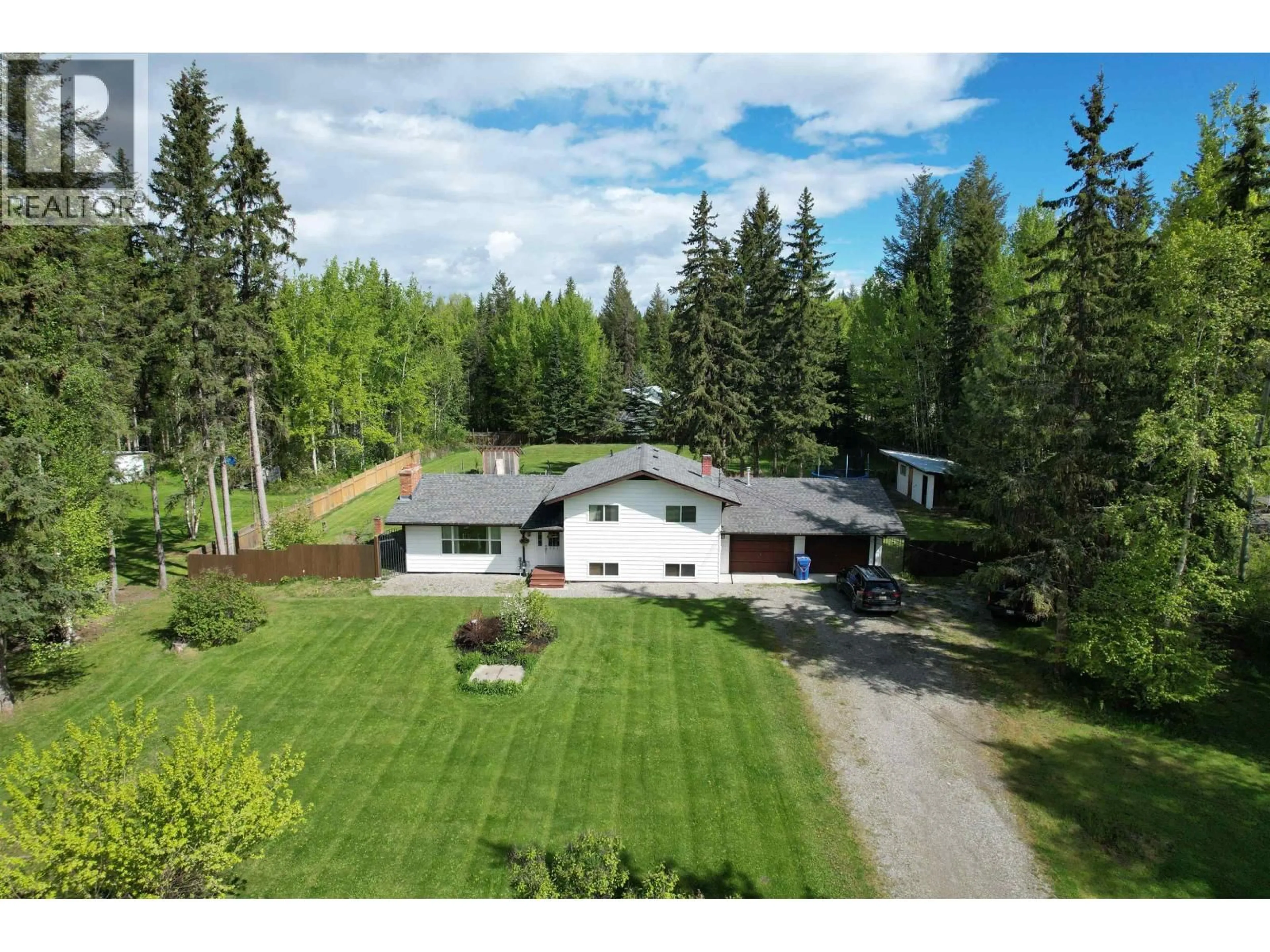 A pic from outside/outdoor area/front of a property/back of a property/a pic from drone, unknown for 721 SERENITY DRIVE, Quesnel British Columbia V2J6W3