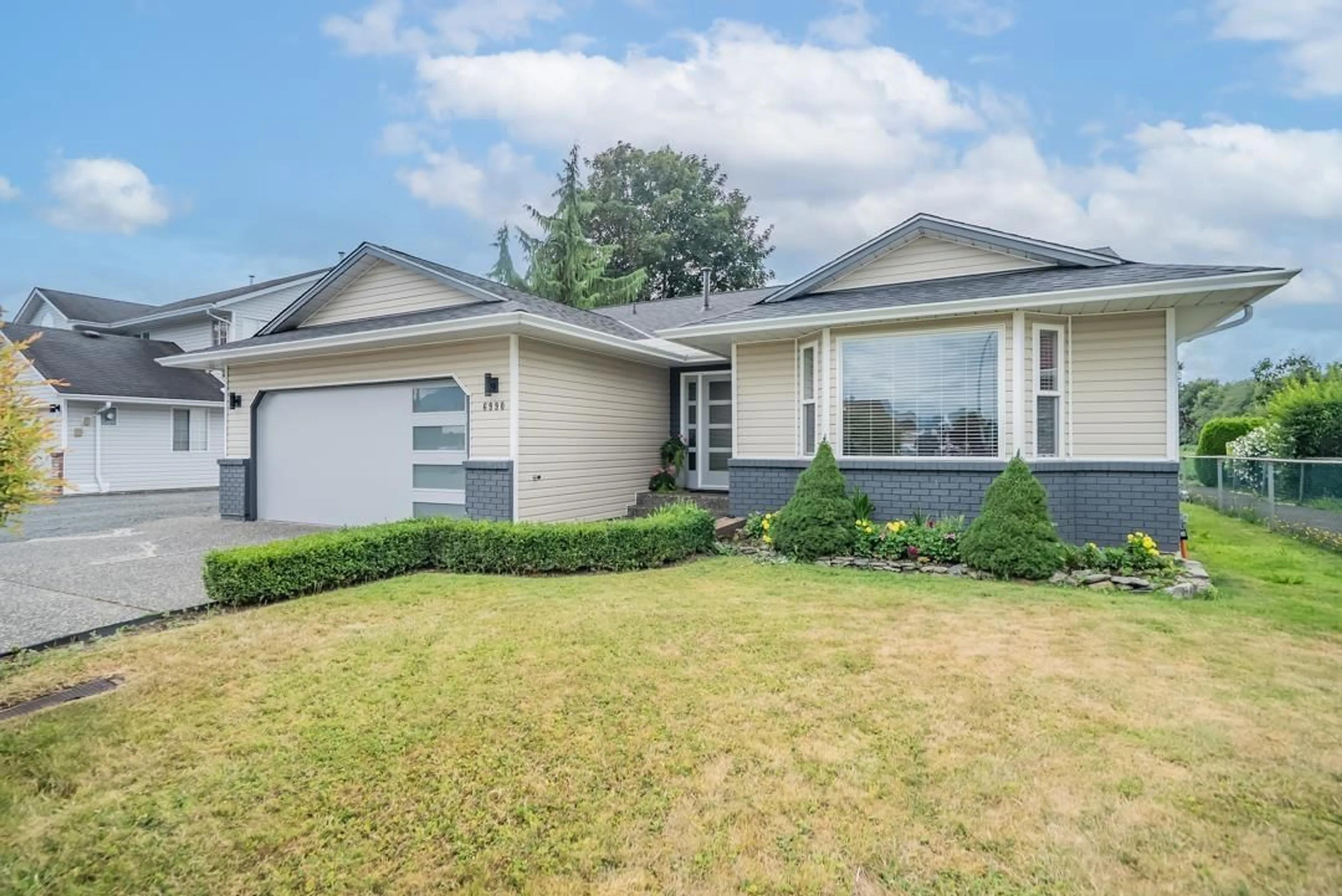 Home with vinyl exterior material, street for 6990 COACH LAMP DRIVE, Chilliwack British Columbia V2R2Y7