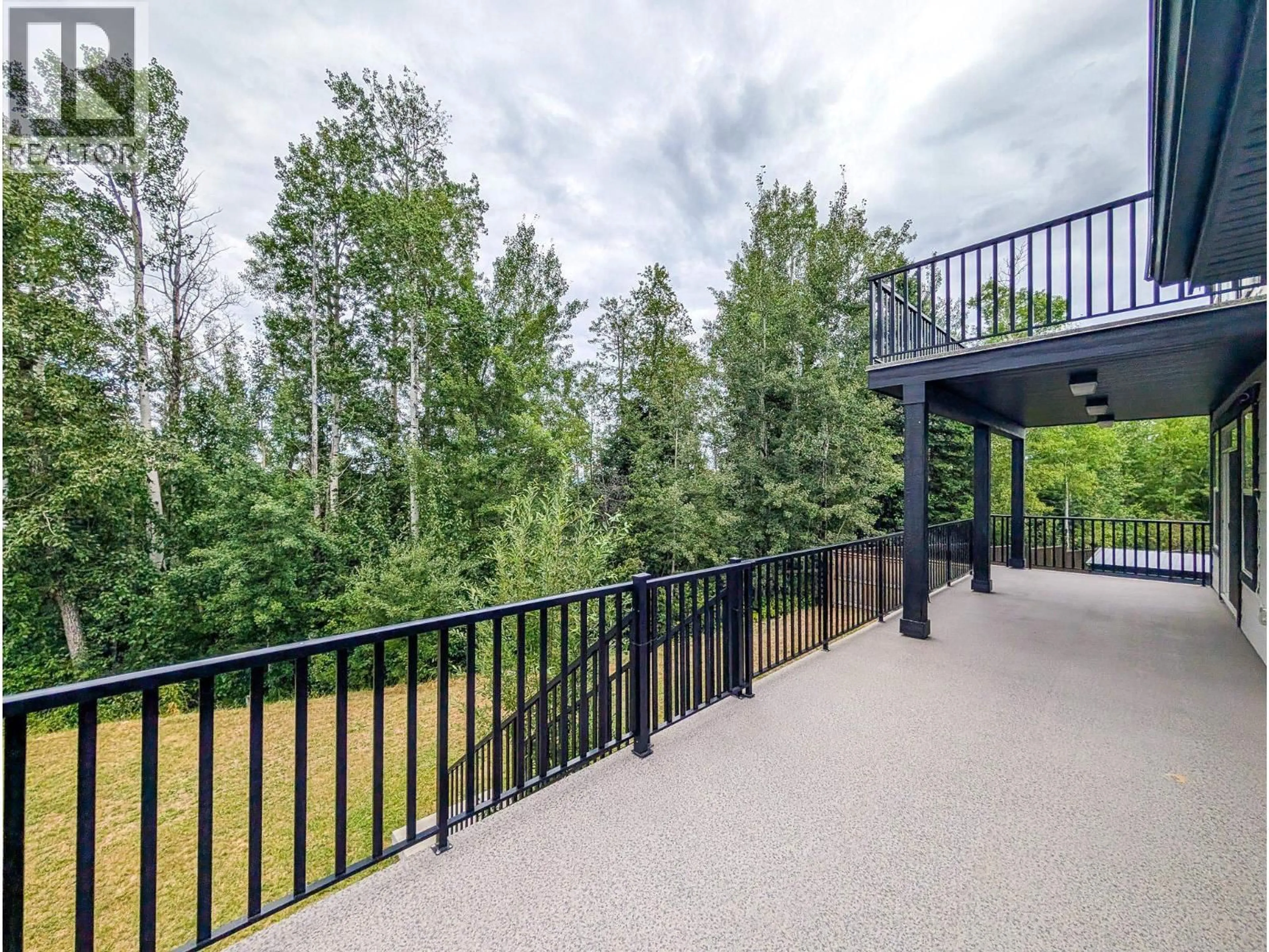 Patio, forest/trees view for 1218 ORIZABA COURT, Prince George British Columbia V2N0B7