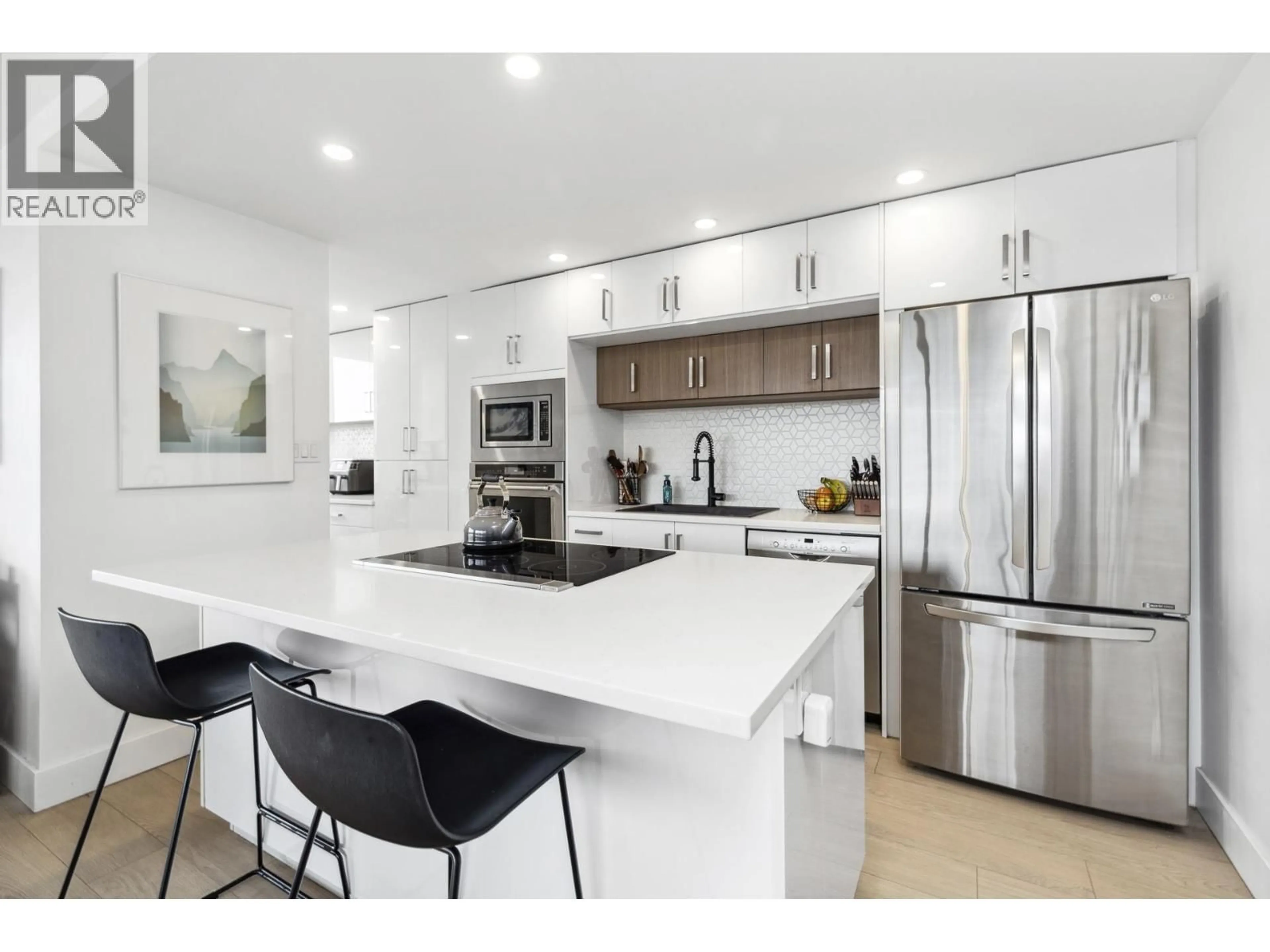 Open concept kitchen, unknown for 1003 - 140 KEITH ROAD, North Vancouver British Columbia V7L4M9