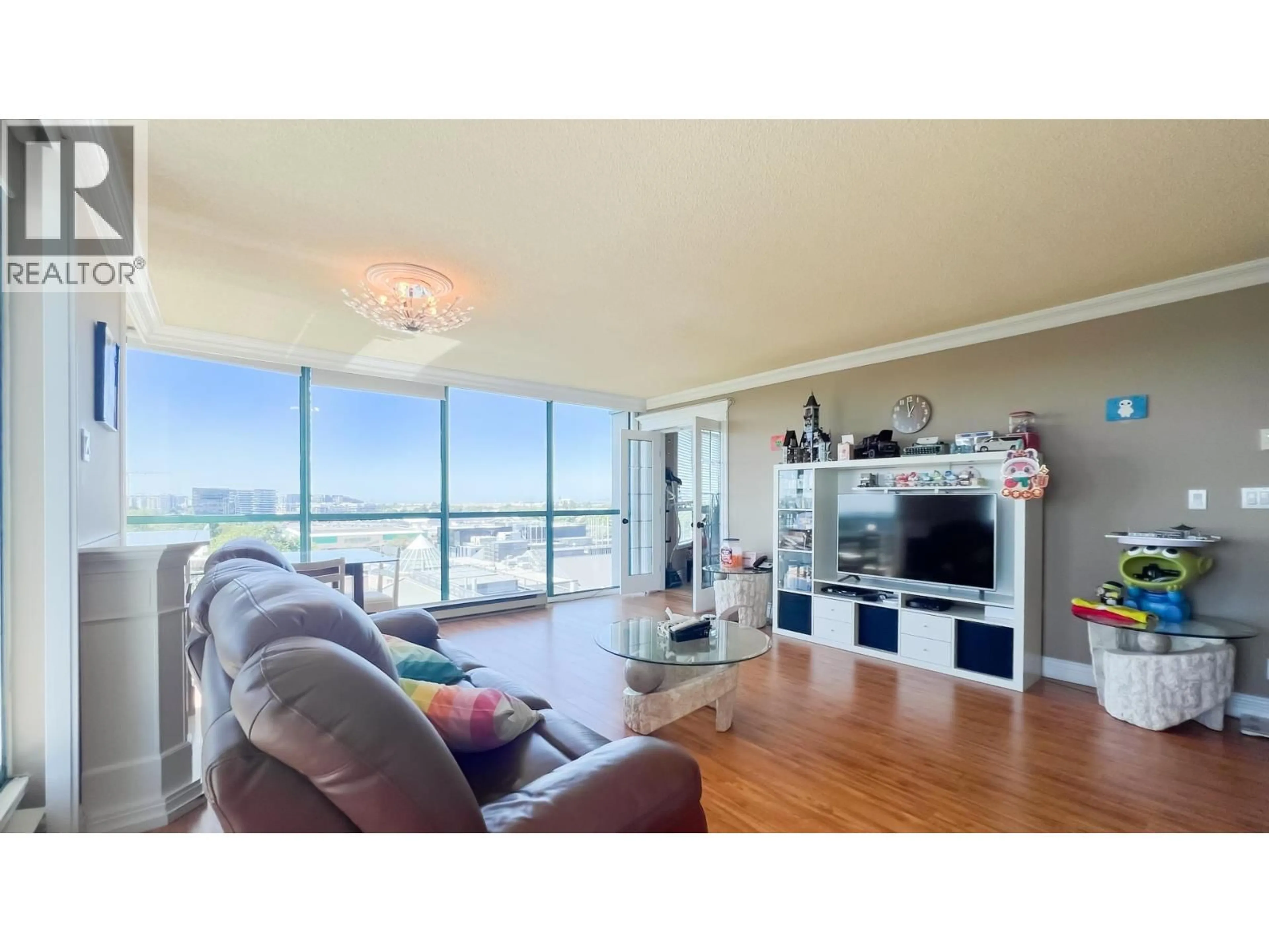 Living room with furniture, wood/laminate floor for 1206 - 8811 LANSDOWNE ROAD, Richmond British Columbia V6X3T4