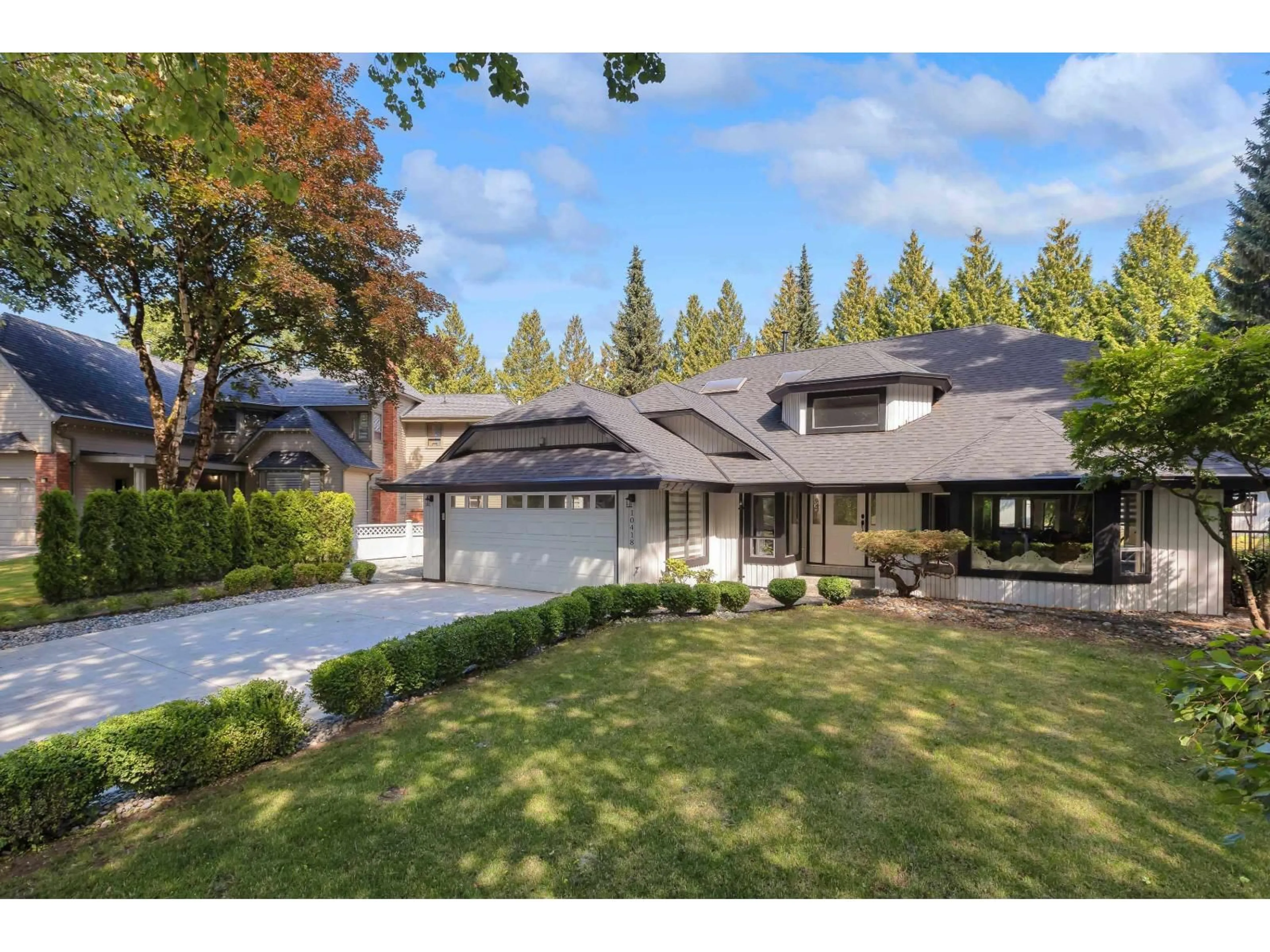 Home with brick exterior material, street for 10418 FRASERGLEN DR, Surrey British Columbia V4N1T5