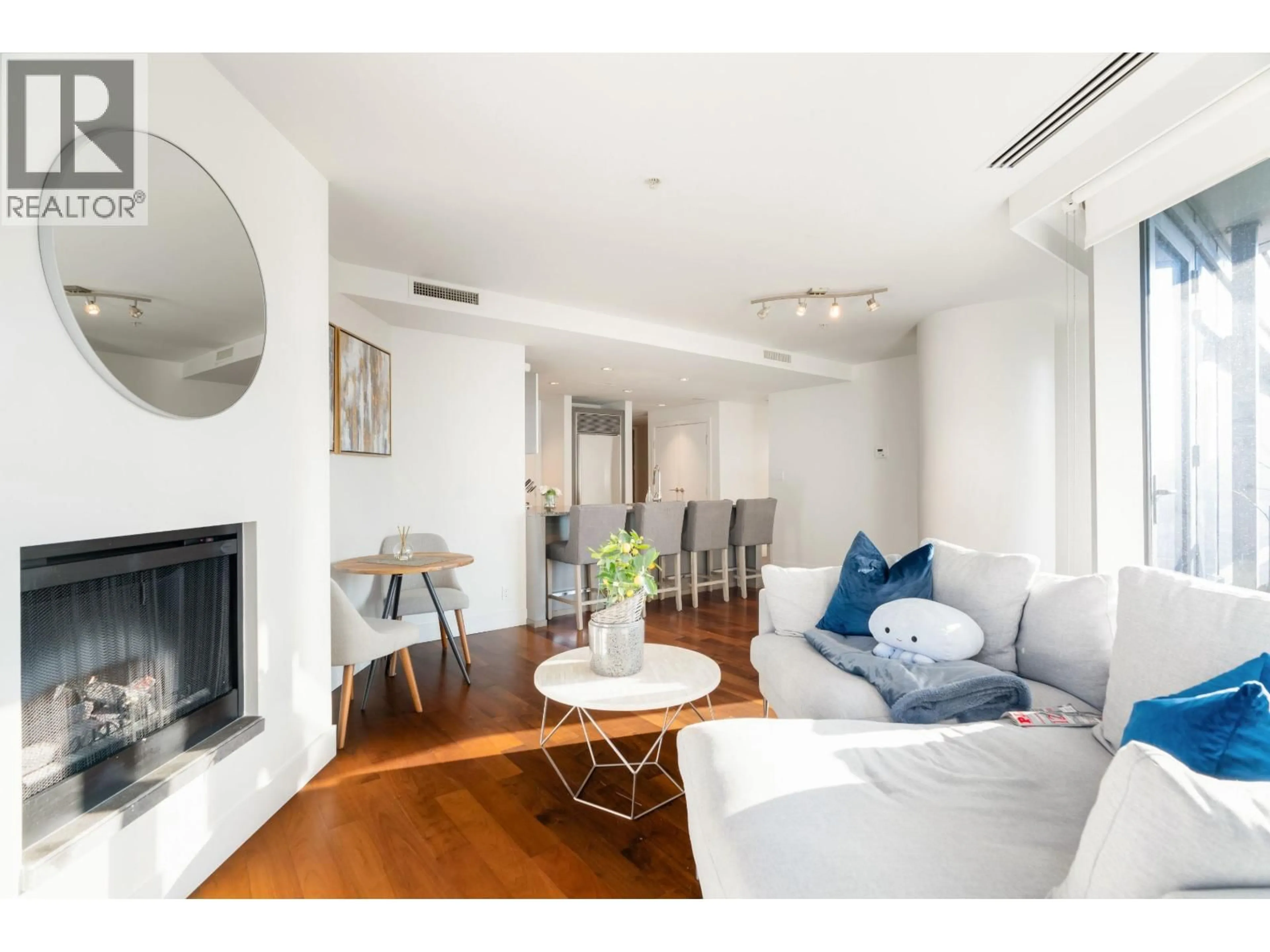 Living room with furniture, wood/laminate floor for 1808 - 1111 ALBERNI STREET, Vancouver British Columbia V6E4V2