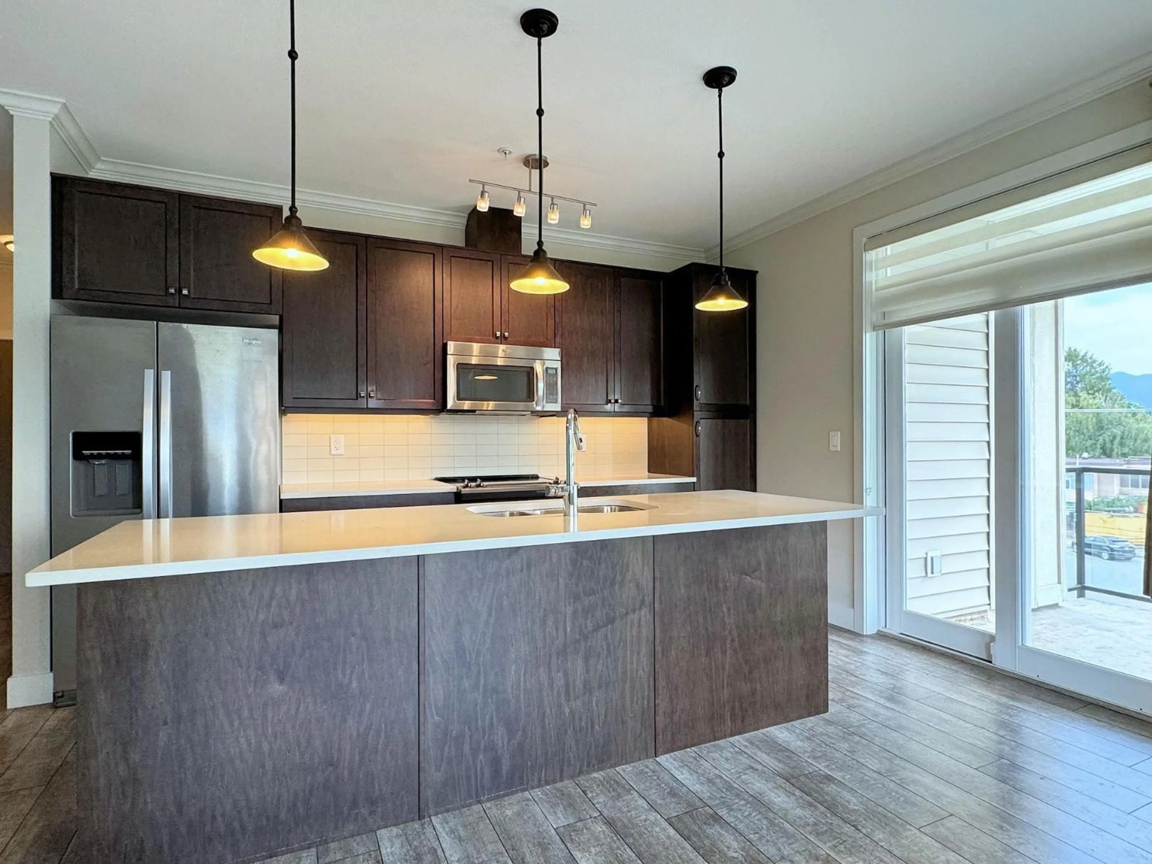 Open concept kitchen, unknown for 301 - 9130 CORBOULD STREET, Chilliwack British Columbia V2P4A5