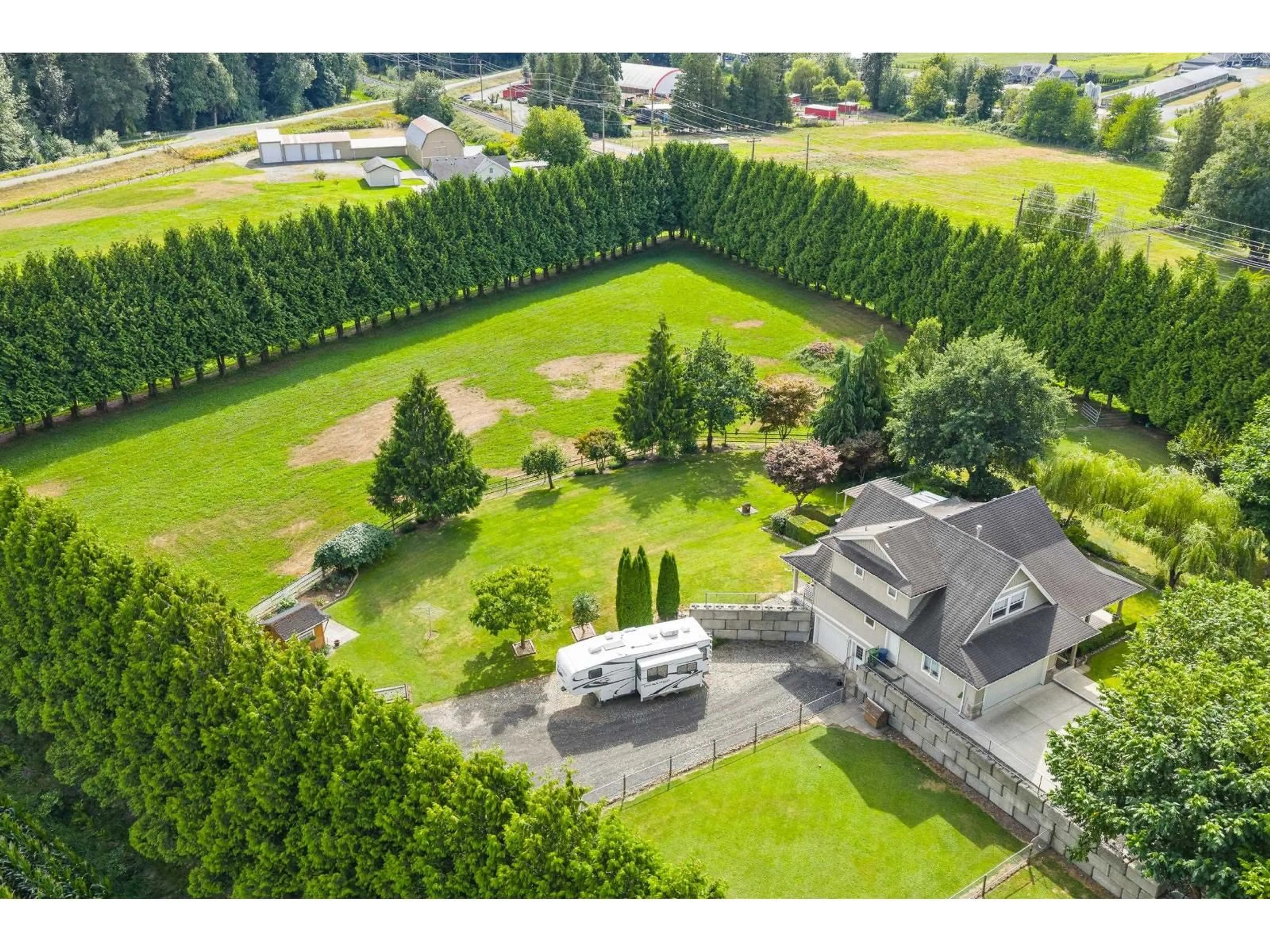 A pic from outside/outdoor area/front of a property/back of a property/a pic from drone, forest/trees view for 5400 SPURLINE ROAD, Sardis - Greendale British Columbia V2R4B4
