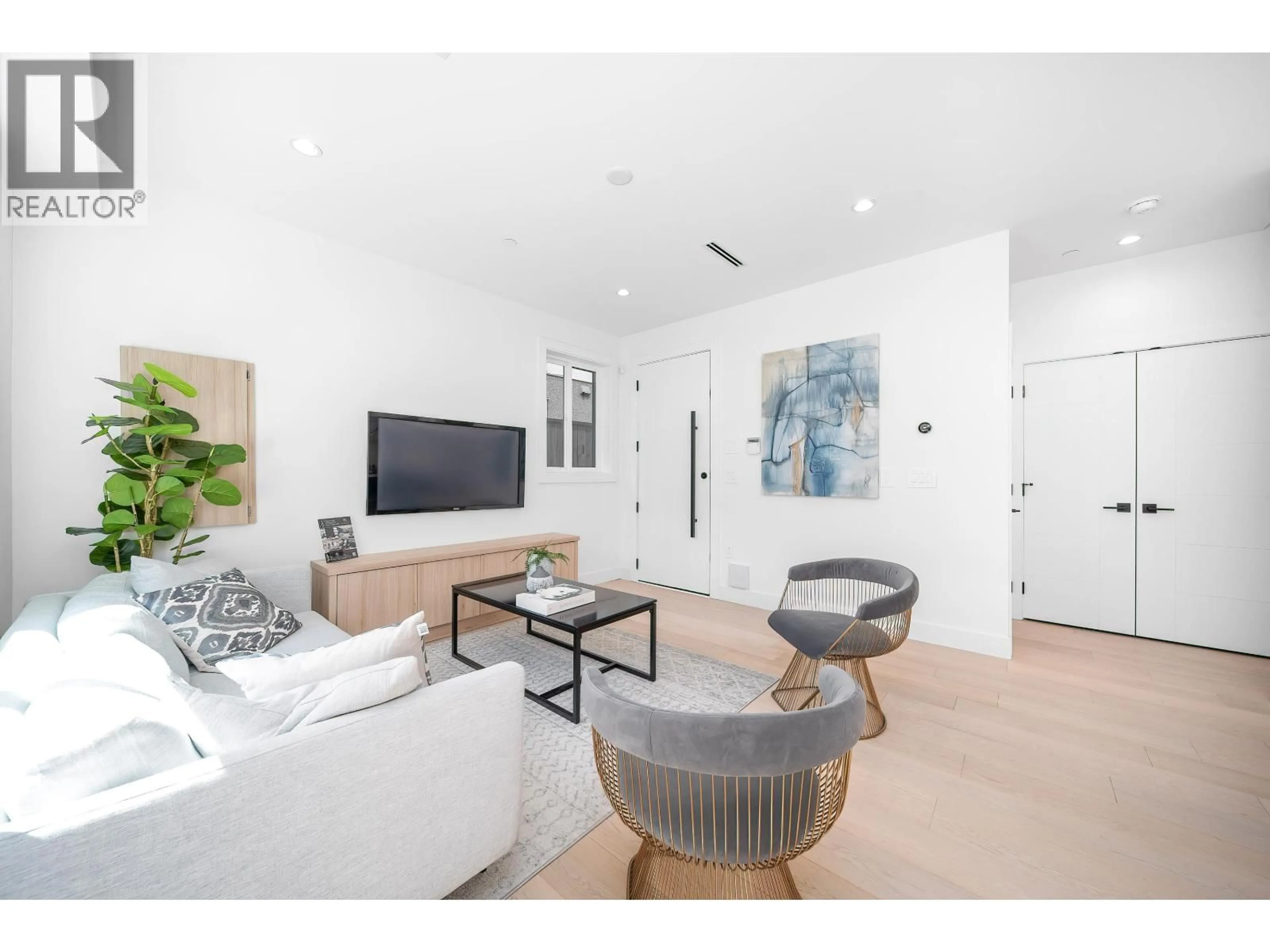 Living room with furniture, wood/laminate floor for 1710 35TH AVENUE, Vancouver British Columbia V5P1B4