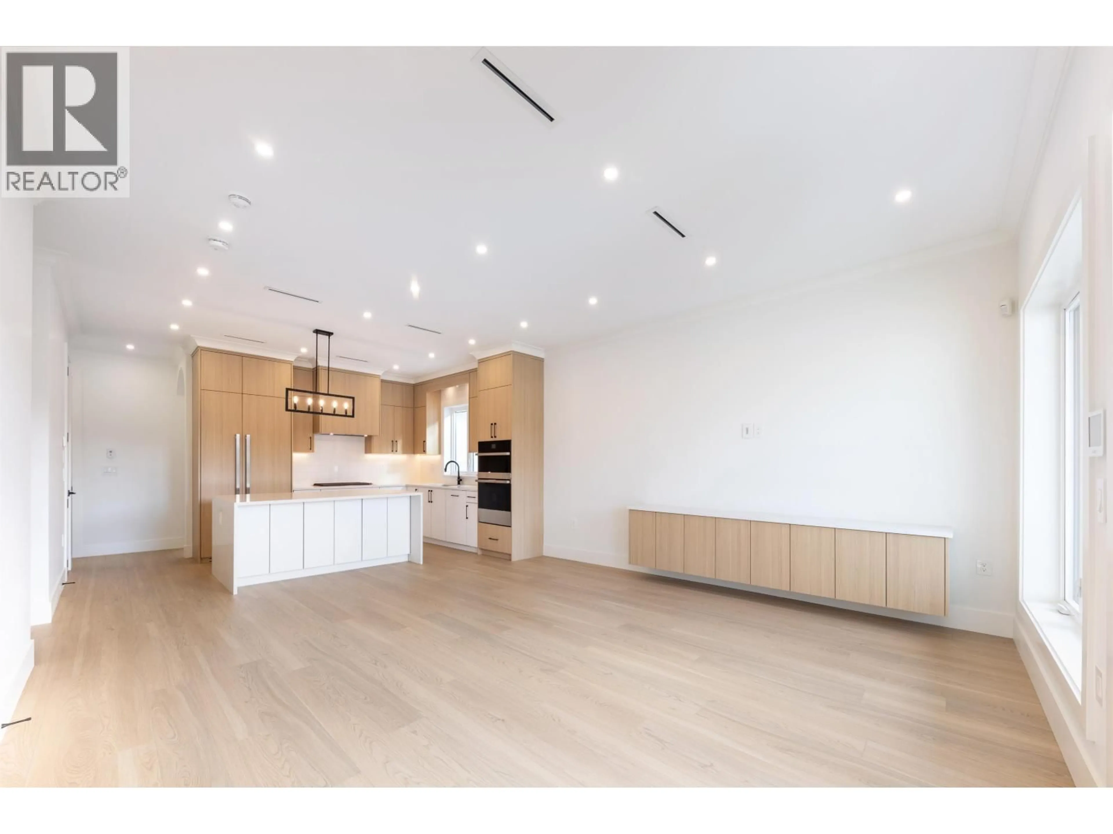 Open concept kitchen, wood/laminate floor for 10446 WILLIAMS ROAD, Richmond British Columbia V7A1H8