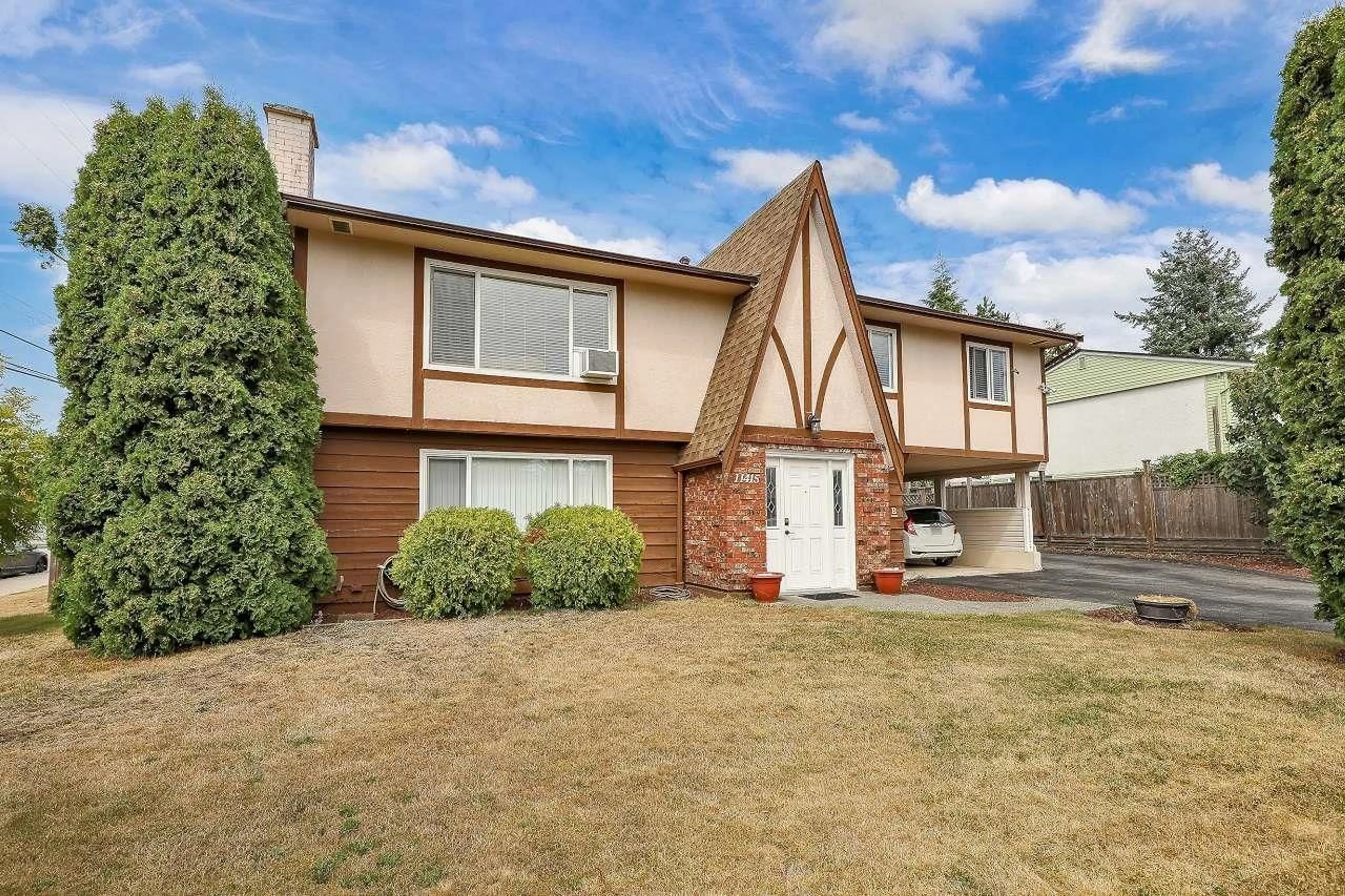 Home with vinyl exterior material, street for 11415 83, Delta British Columbia V4C2G7