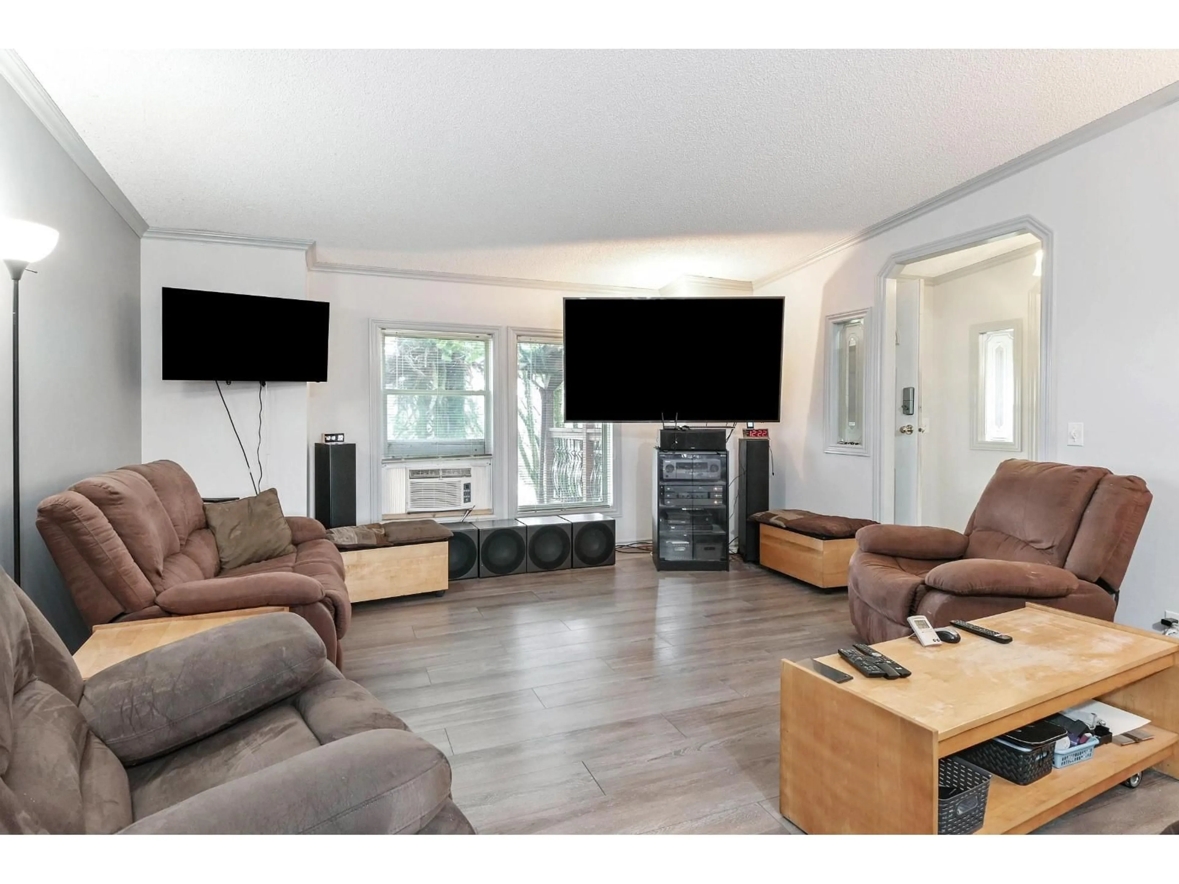 Living room with furniture, wood/laminate floor for 24643 21B, Langley British Columbia V2Z1J3