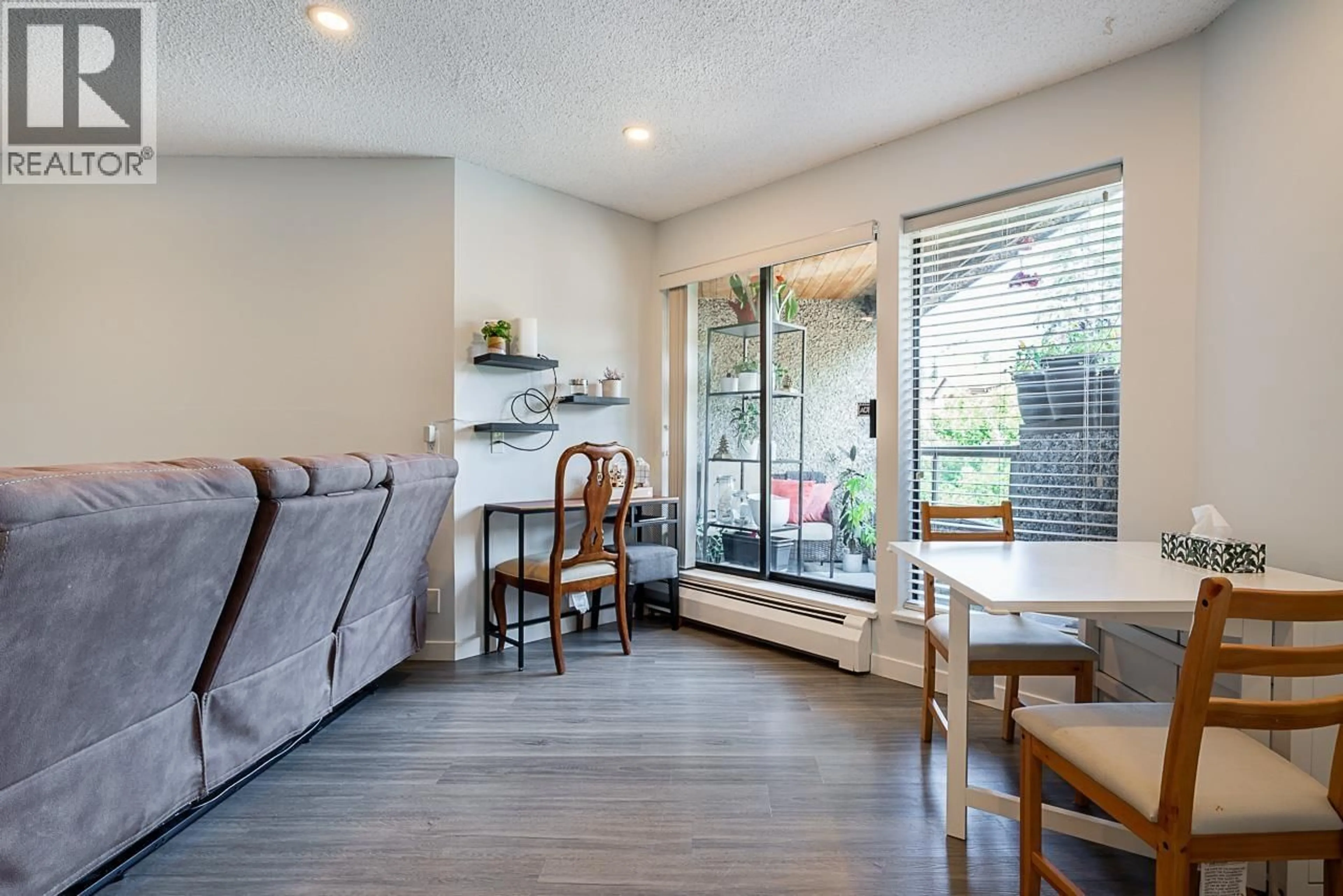 Living room with furniture, wood/laminate floor for 204 - 8451 WESTMINSTER HIGHWAY, Richmond British Columbia V6X3E4