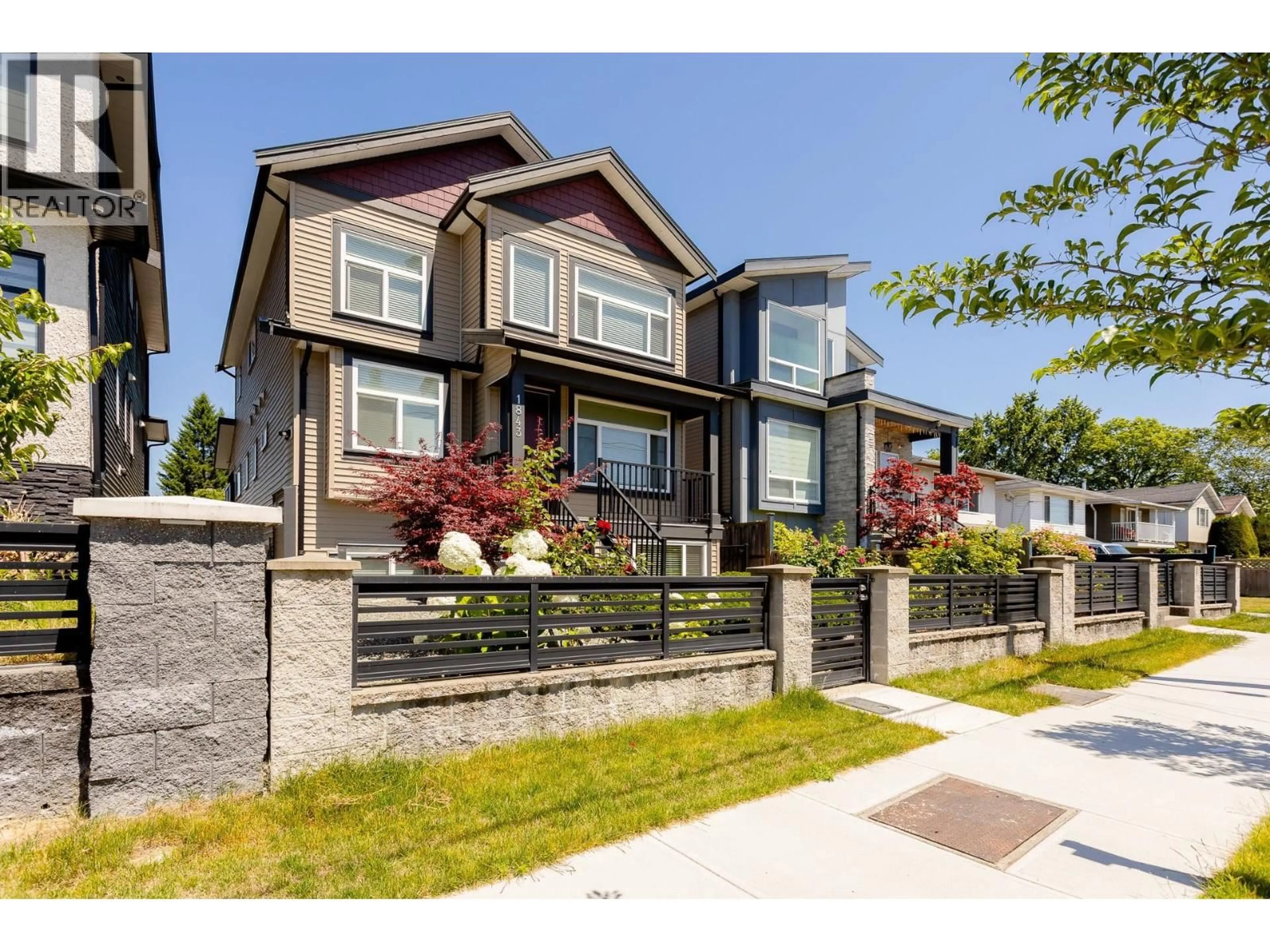Home with vinyl exterior material, street for 1843 FRASER AVENUE, Port Coquitlam British Columbia V3B1N2