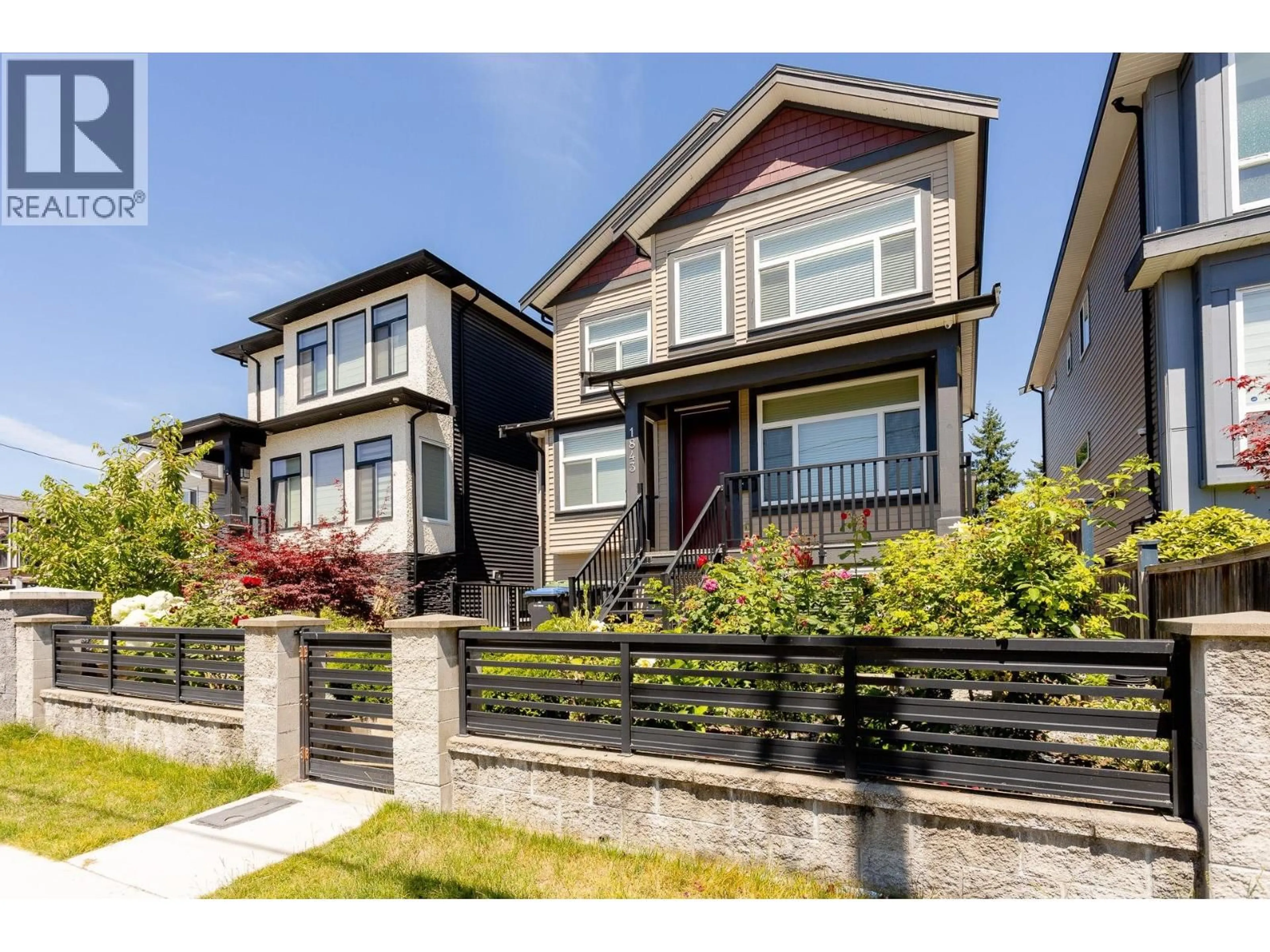 Home with vinyl exterior material, street for 1843 FRASER AVENUE, Port Coquitlam British Columbia V3B1N2