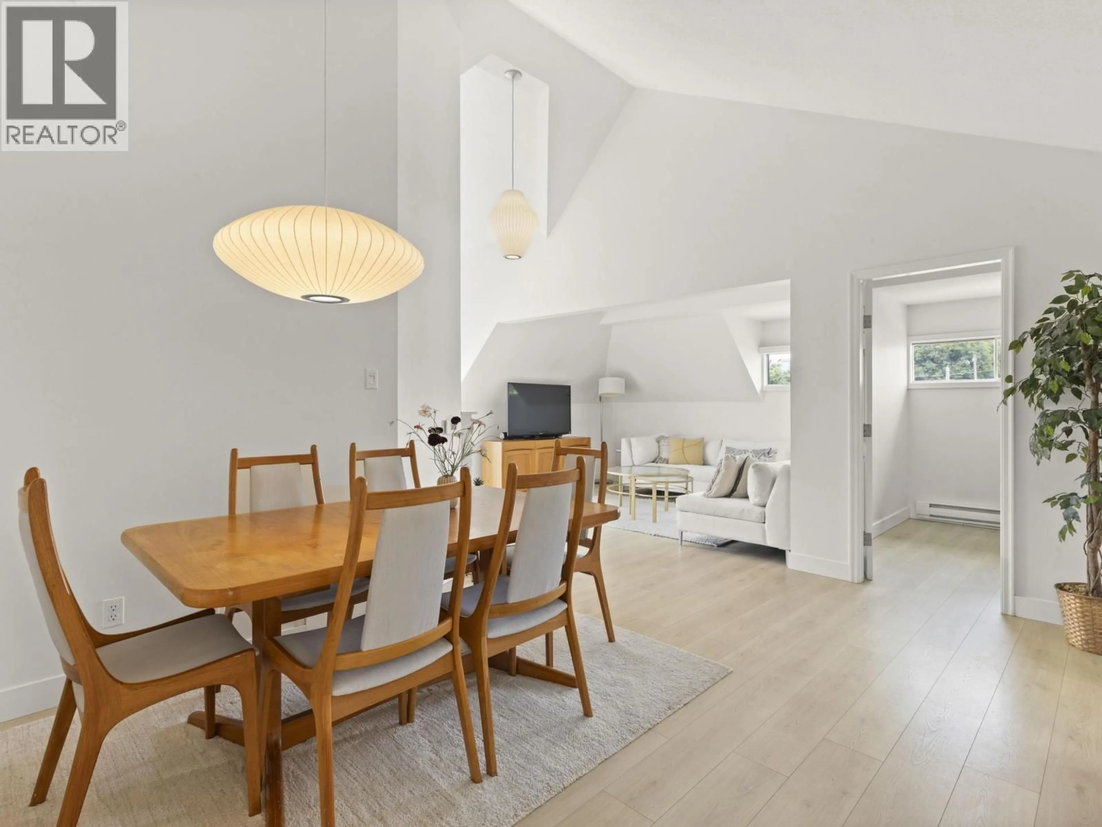 Dining room, wood/laminate floor for 1902 STEPHENS STREET, Vancouver British Columbia V6K3V9