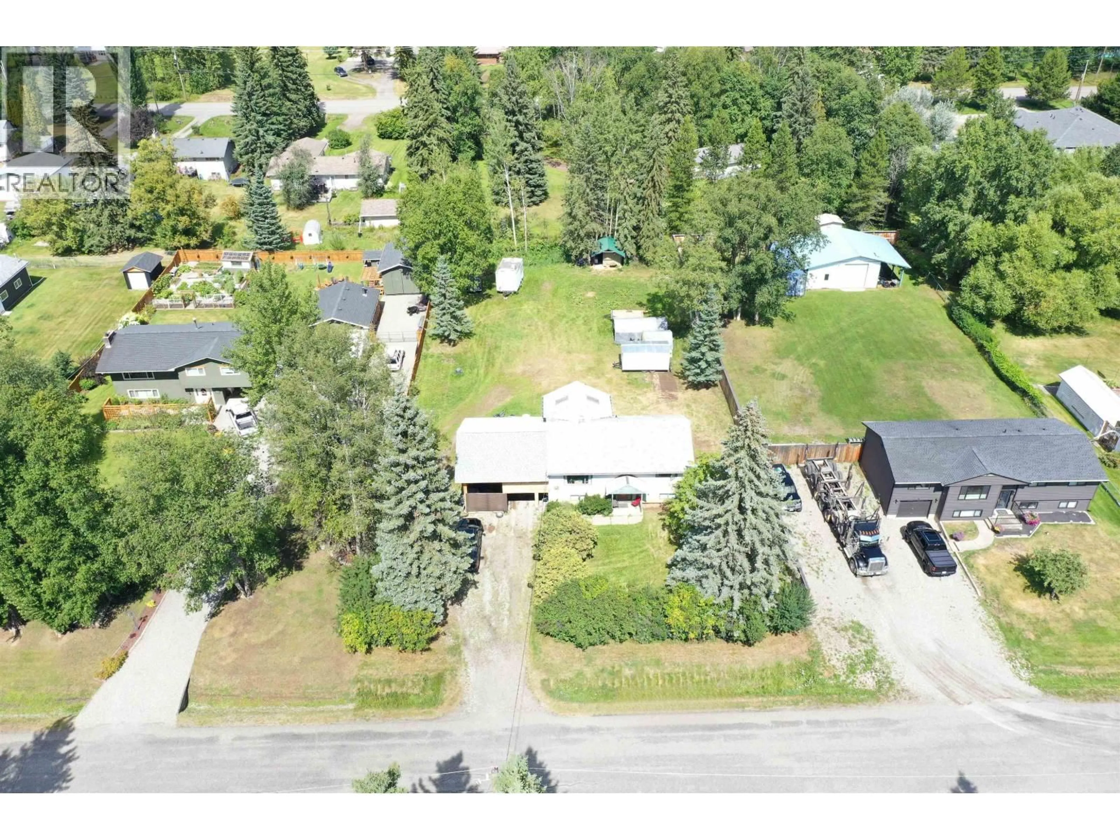 A pic from outside/outdoor area/front of a property/back of a property/a pic from drone, street for 1834 LOMBARDIE DRIVE, Quesnel British Columbia V2J4A9