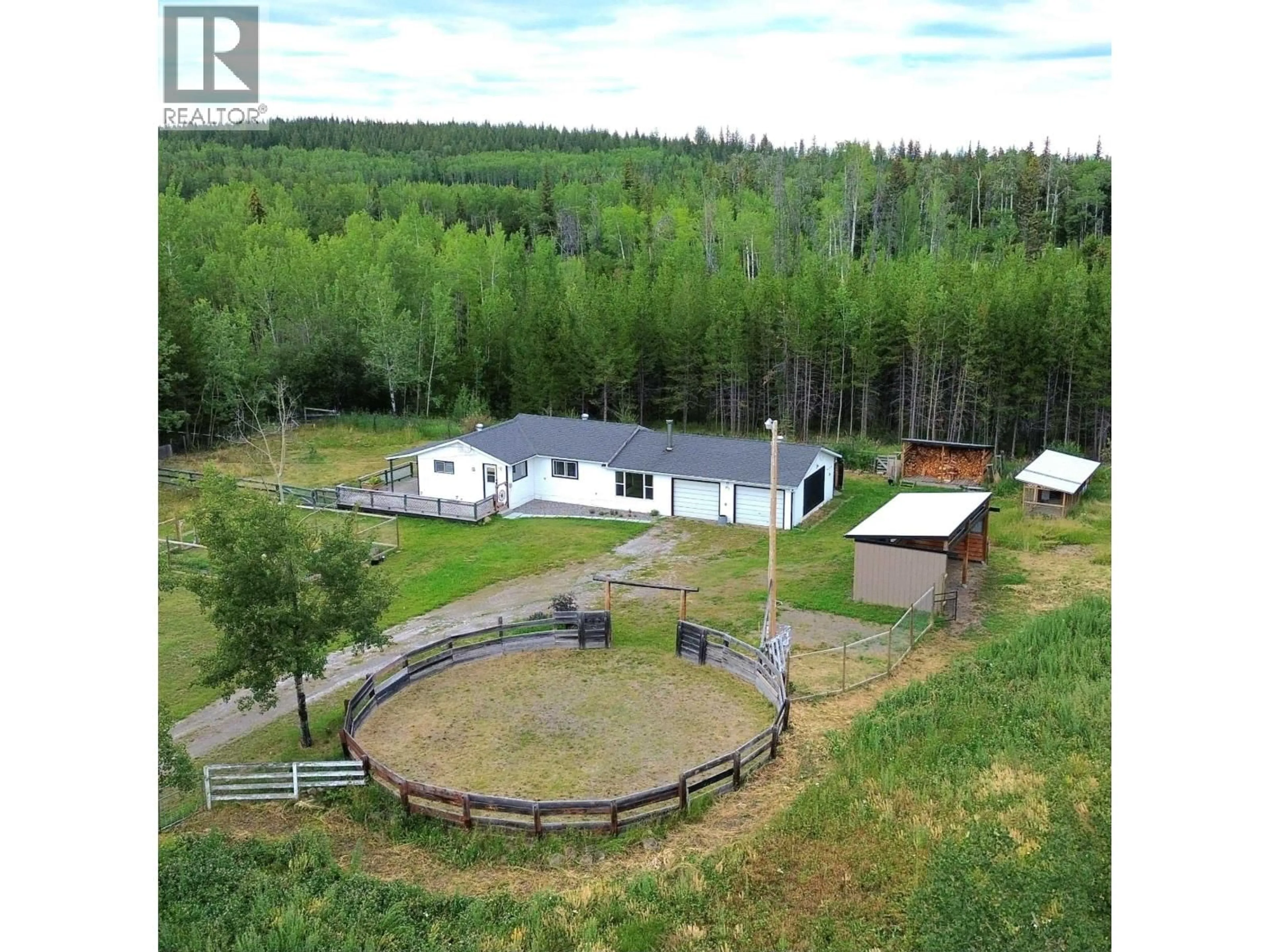 A pic from outside/outdoor area/front of a property/back of a property/a pic from drone, unknown for 6813 SWELANDER ROAD, 100 Mile House British Columbia V0K2E2