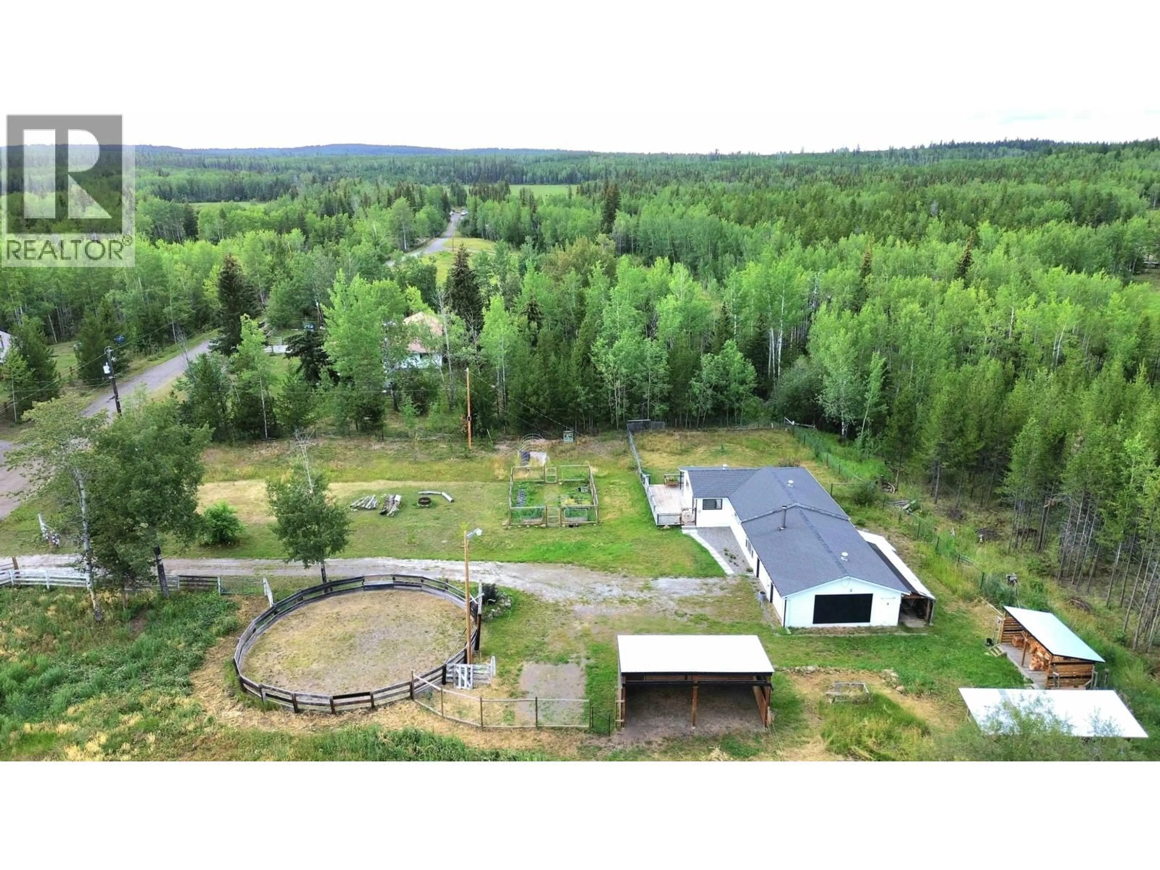 A pic from outside/outdoor area/front of a property/back of a property/a pic from drone, unknown for 6813 SWELANDER ROAD, 100 Mile House British Columbia V0K2E2
