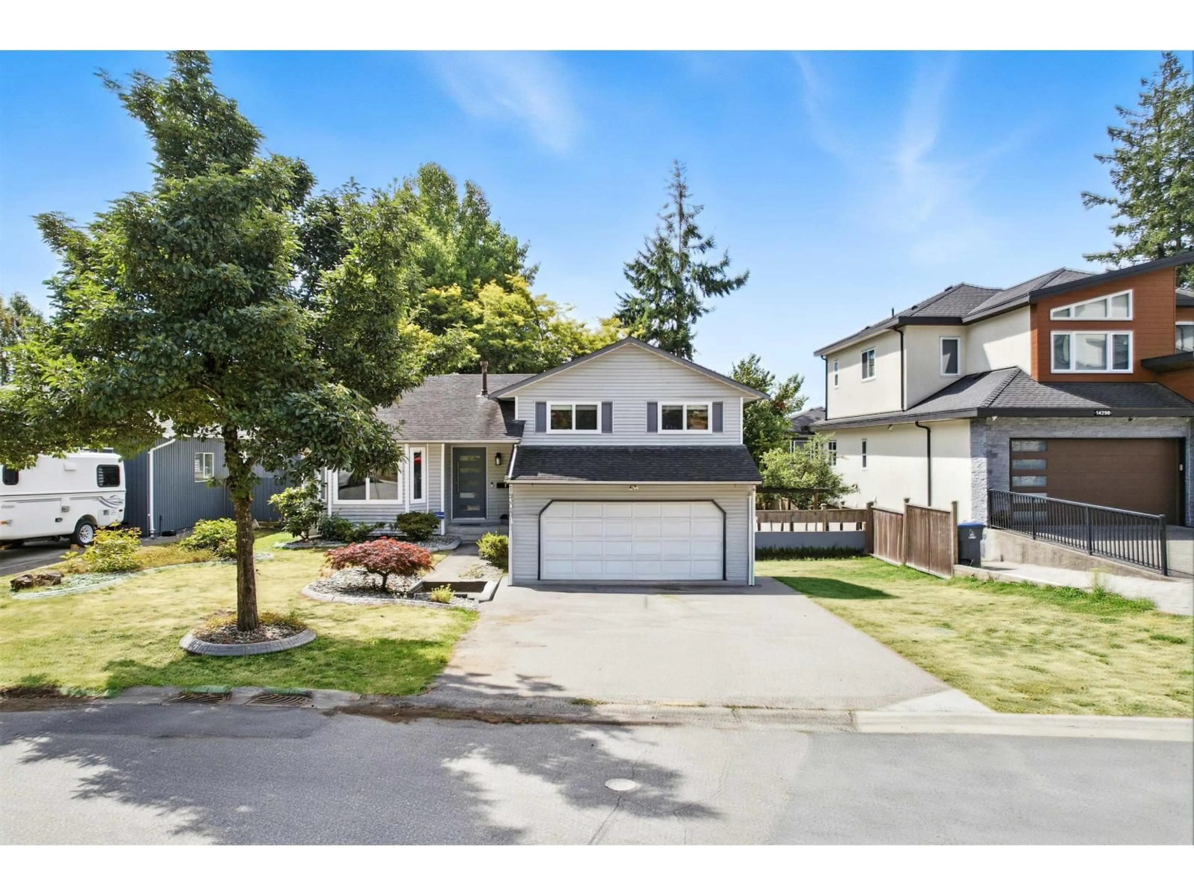 Home with vinyl exterior material, street for 14308 68A, Surrey British Columbia V3W8W4