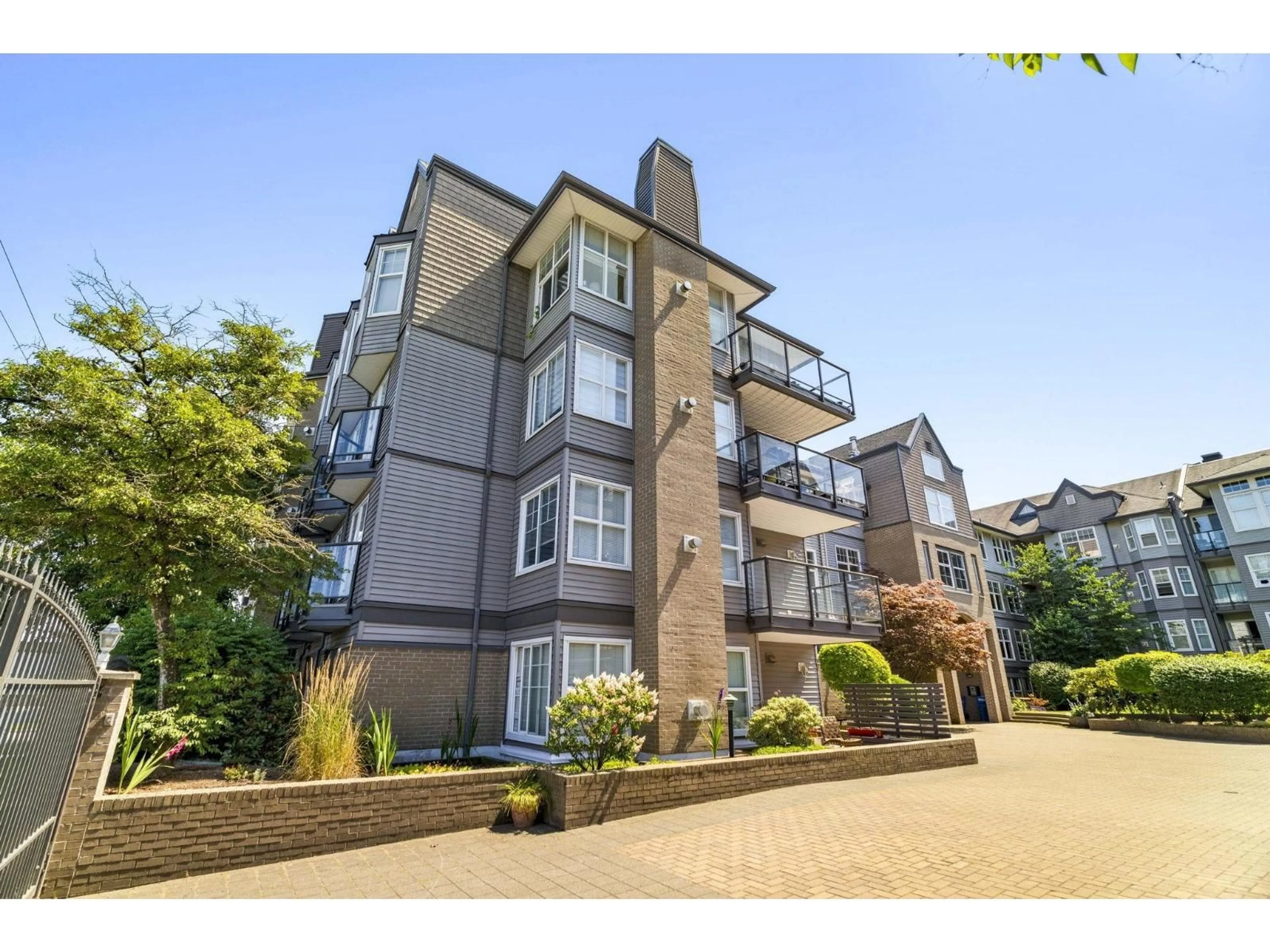 A pic from outside/outdoor area/front of a property/back of a property/a pic from drone, unknown for 217 - 20200 56, Langley British Columbia V3A8S1