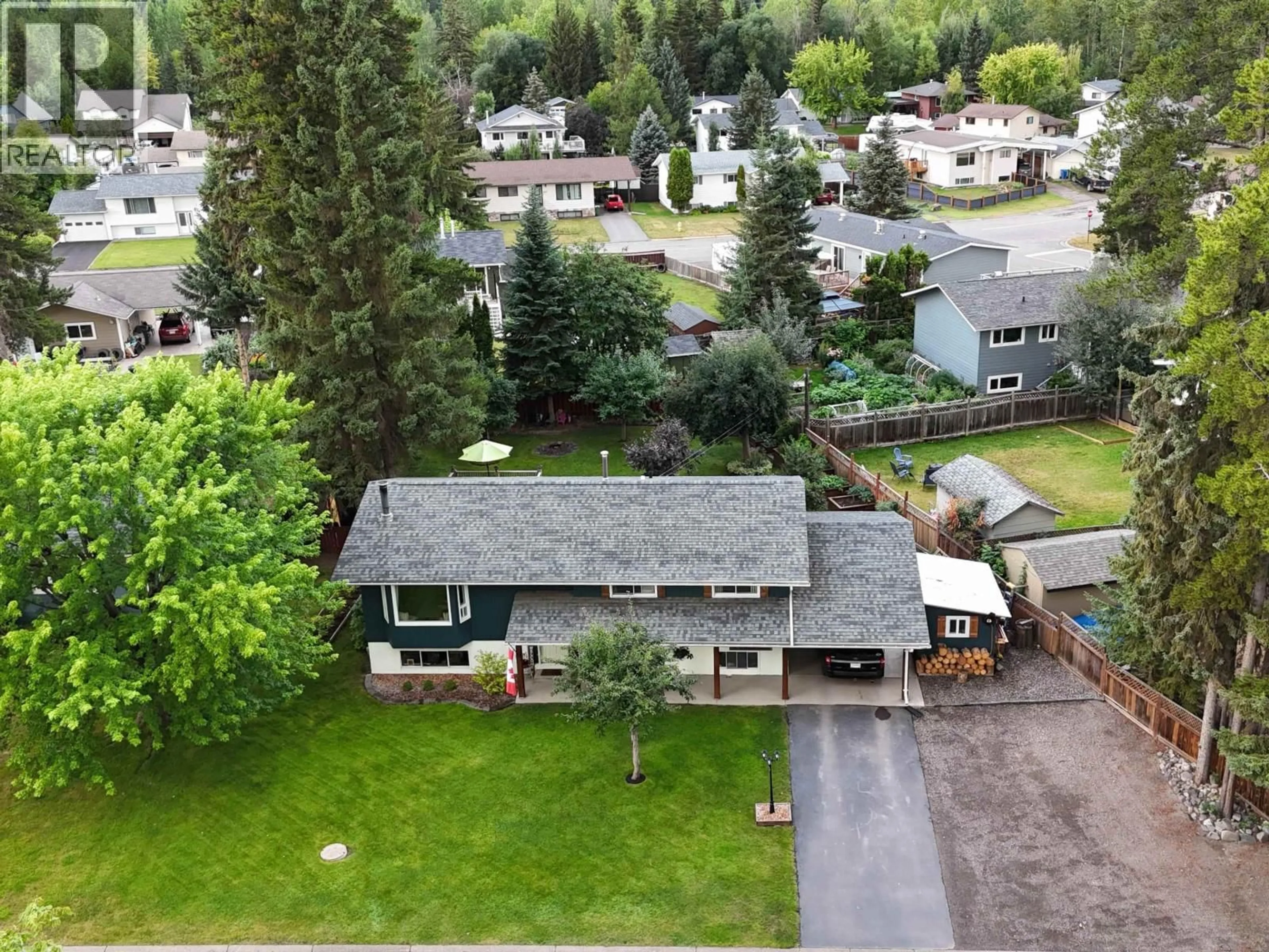 A pic from outside/outdoor area/front of a property/back of a property/a pic from drone, mountain view for 4381 BIRCH CRESCENT, Smithers British Columbia V0J2N0