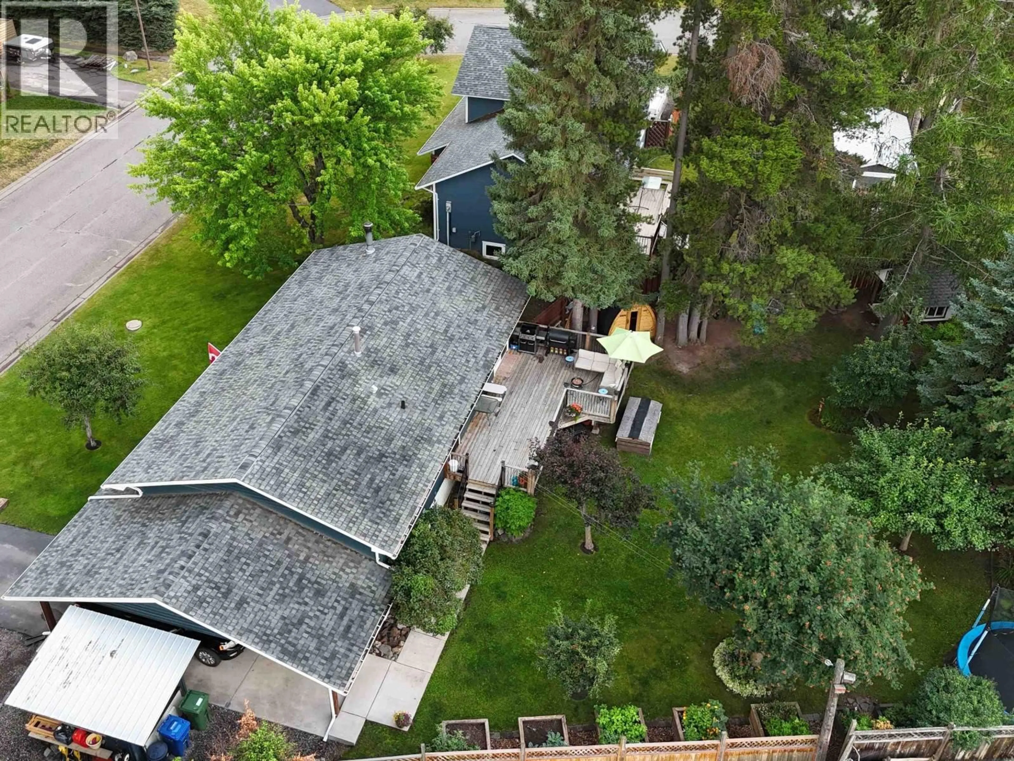 A pic from outside/outdoor area/front of a property/back of a property/a pic from drone, unknown for 4381 BIRCH CRESCENT, Smithers British Columbia V0J2N0
