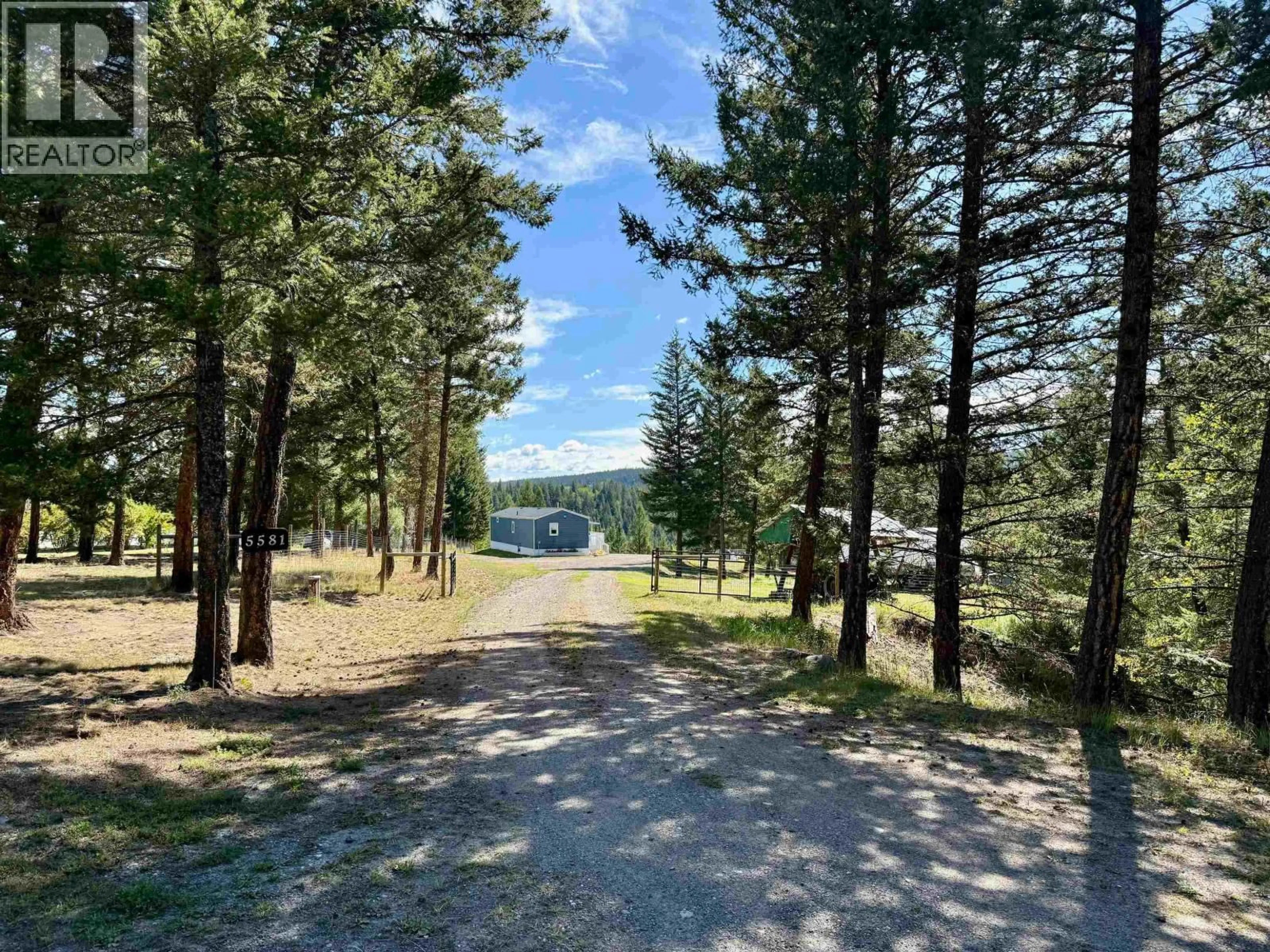A pic from outside/outdoor area/front of a property/back of a property/a pic from drone, forest/trees view for 5581 BIRCHWOOD ROAD, 100 Mile House British Columbia V0K2E0