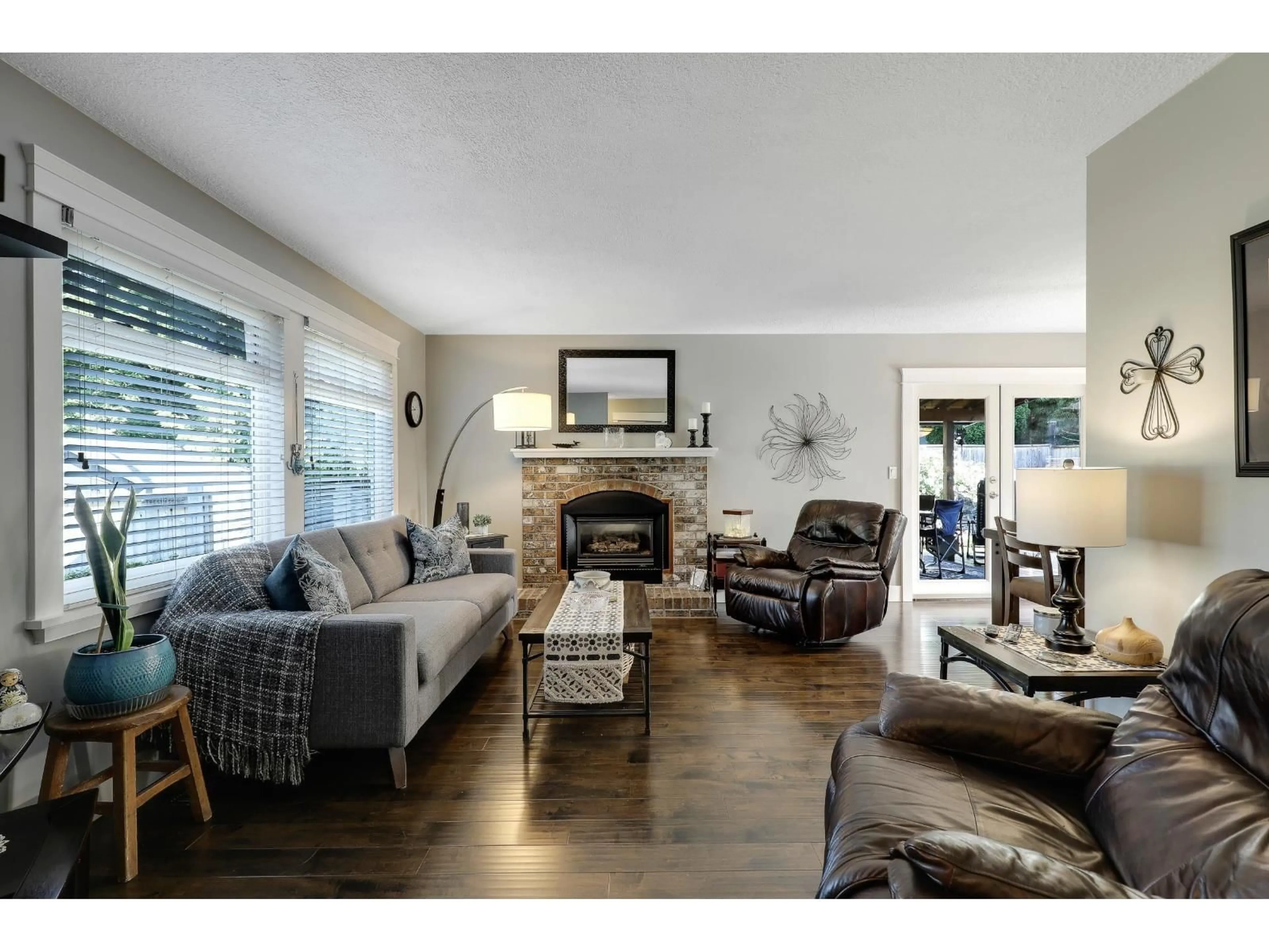 Living room with furniture, wood/laminate floor for 6306 195, Surrey British Columbia V3S7L9