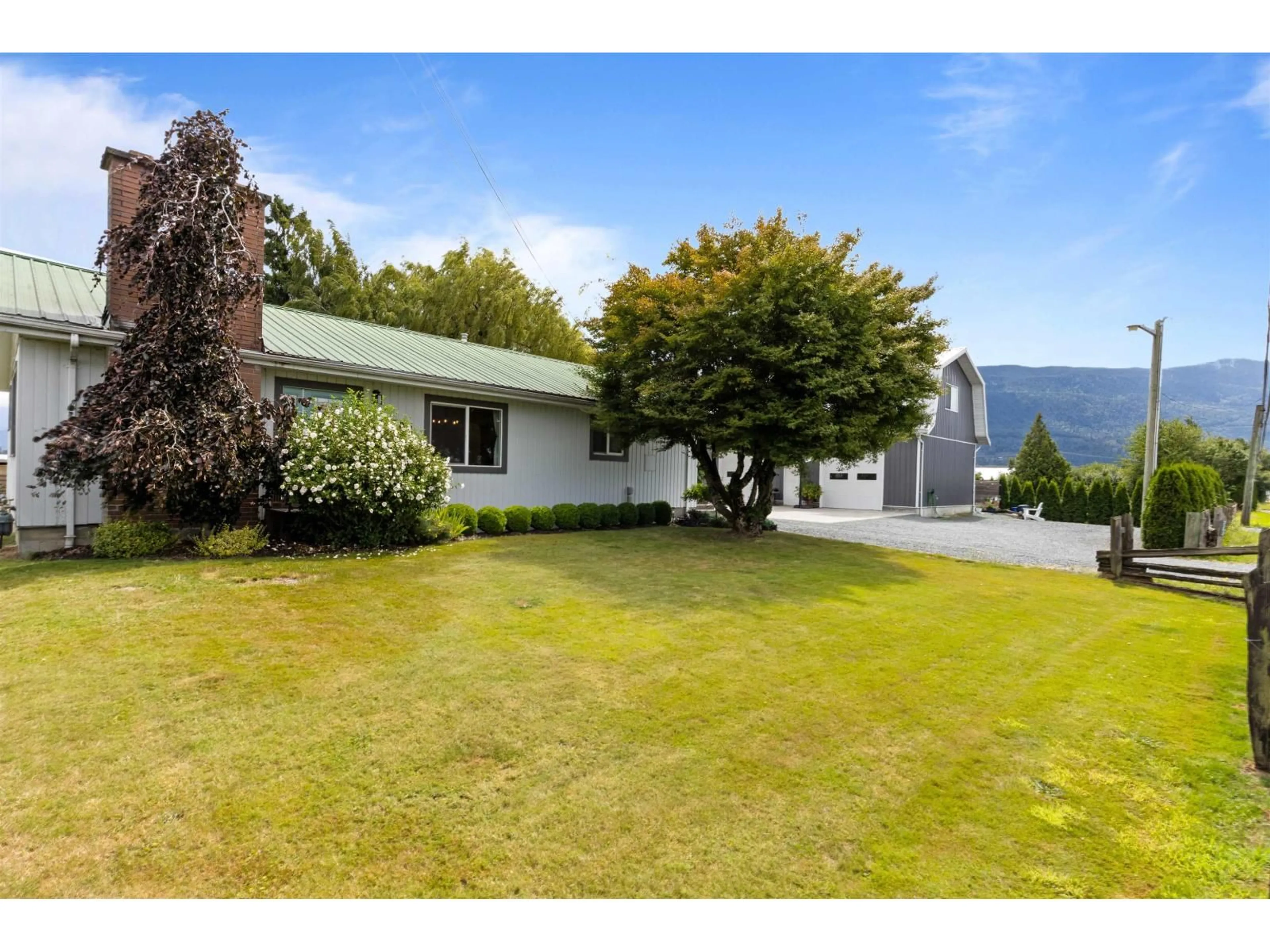 A pic from outside/outdoor area/front of a property/back of a property/a pic from drone, water/lake/river/ocean view for 5702 SUMAS PRAIRIE ROAD, Sardis - Greendale British Columbia V2R4N6