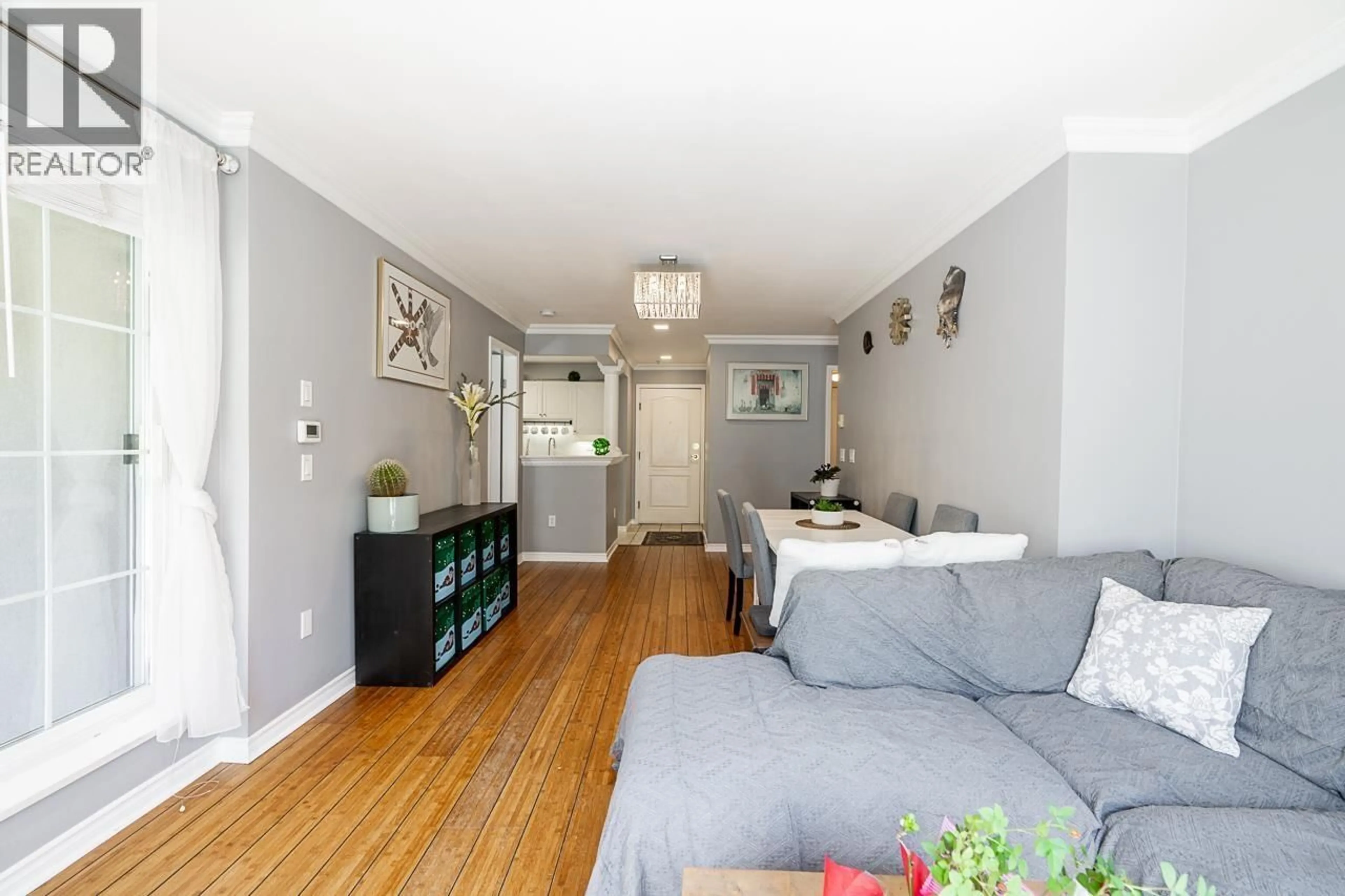 Living room with furniture, wood/laminate floor for 110 - 1669 GRANT AVENUE, Port Coquitlam British Columbia V3B7W9