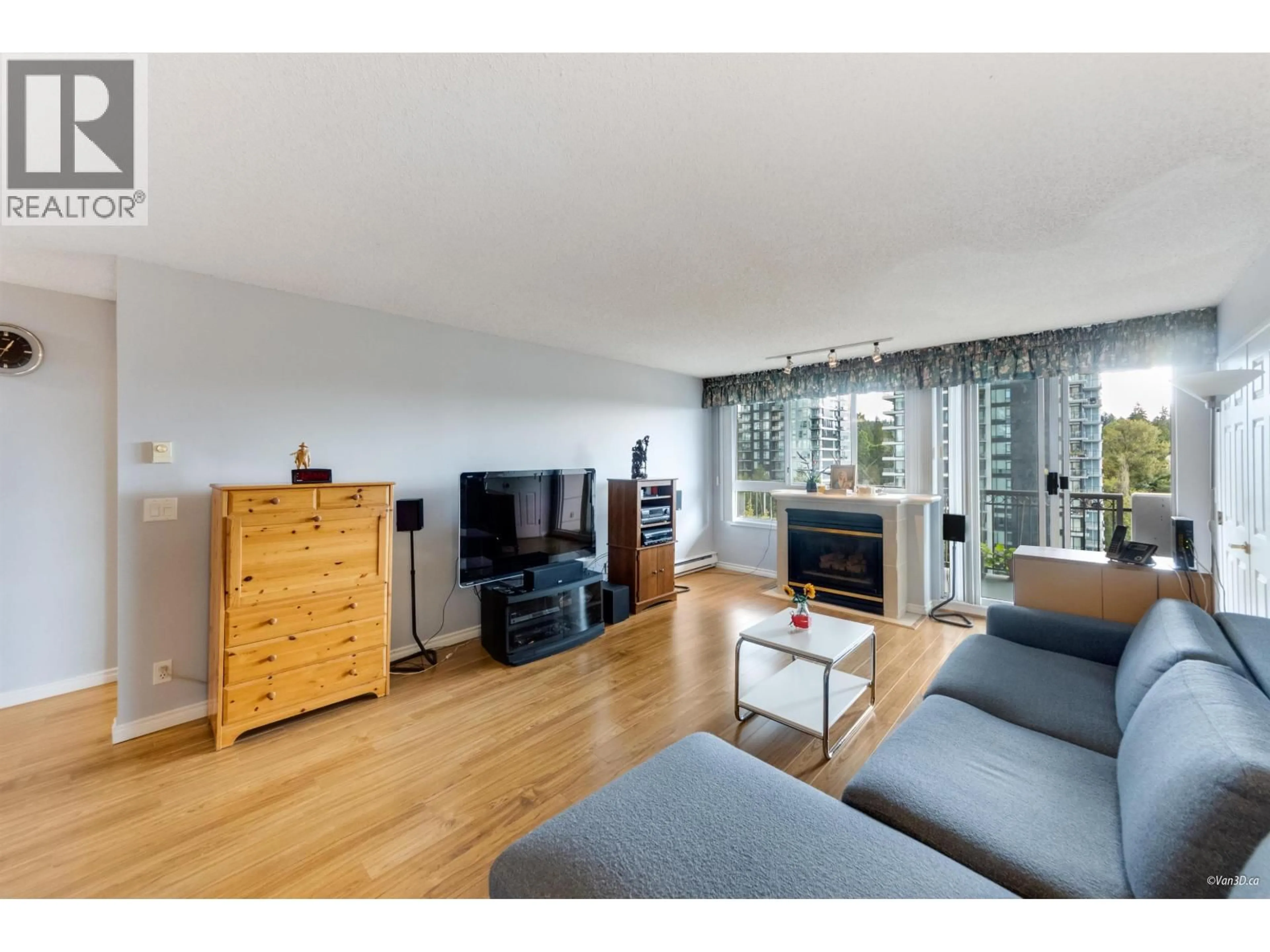Living room with furniture, wood/laminate floor for 1404 - 555 AUSTIN AVENUE, Coquitlam British Columbia V3K6R8