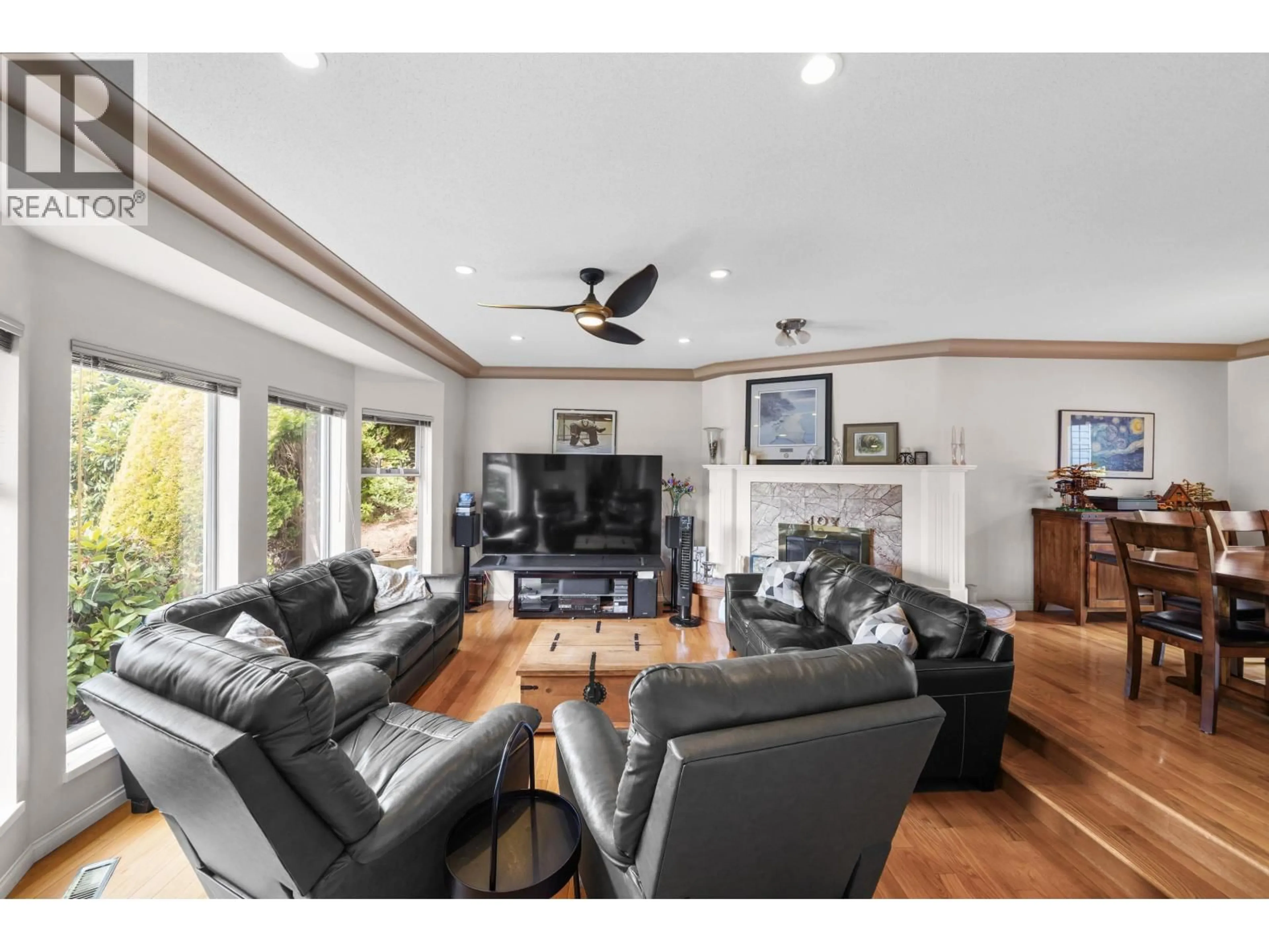 Living room with furniture, wood/laminate floor for 2215 SORRENTO DRIVE, Coquitlam British Columbia V3K6H6