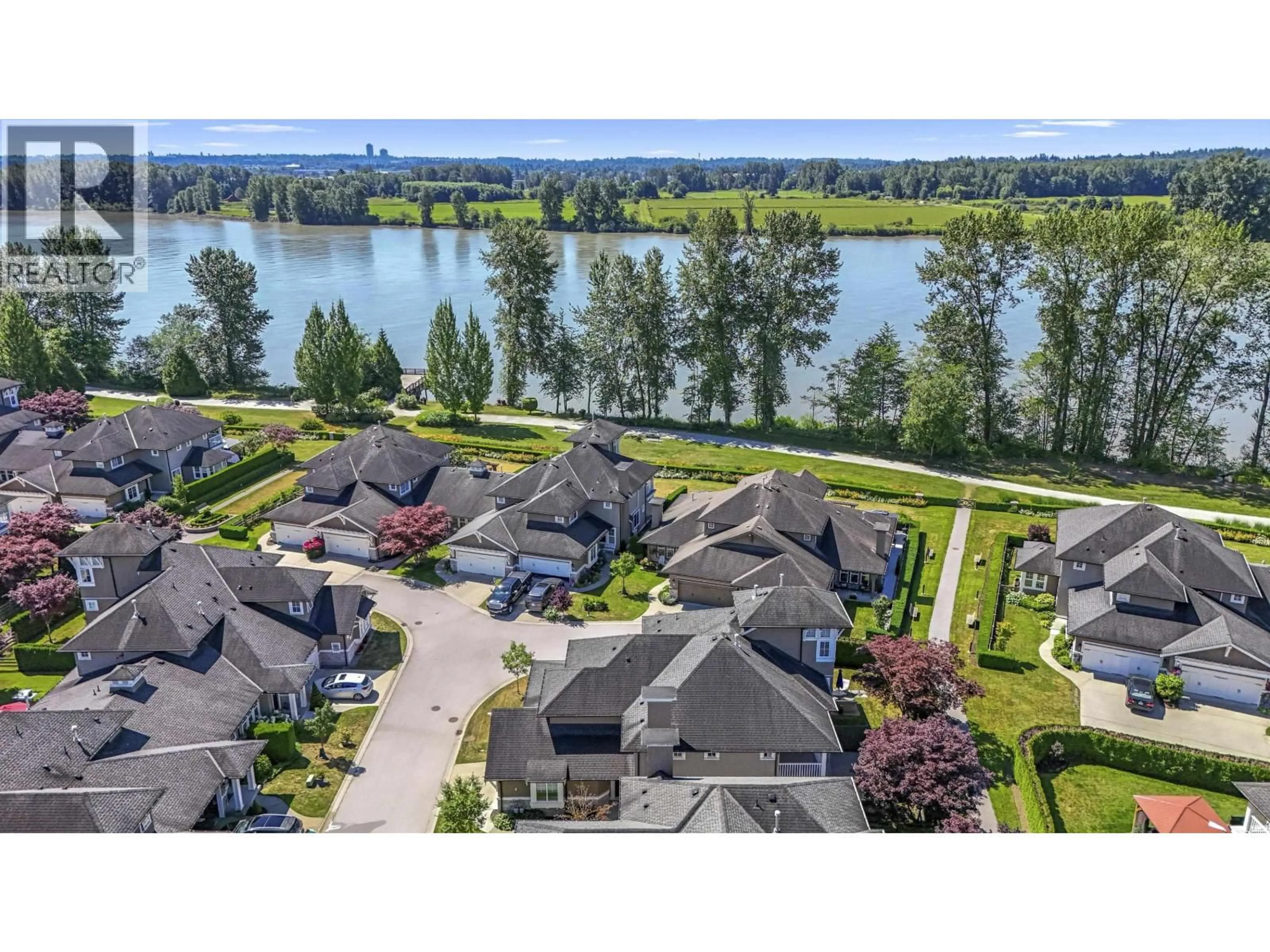 A pic from outside/outdoor area/front of a property/back of a property/a pic from drone, water/lake/river/ocean view for 32 - 19452 FRASER WAY, Pitt Meadows British Columbia V3Y0A3