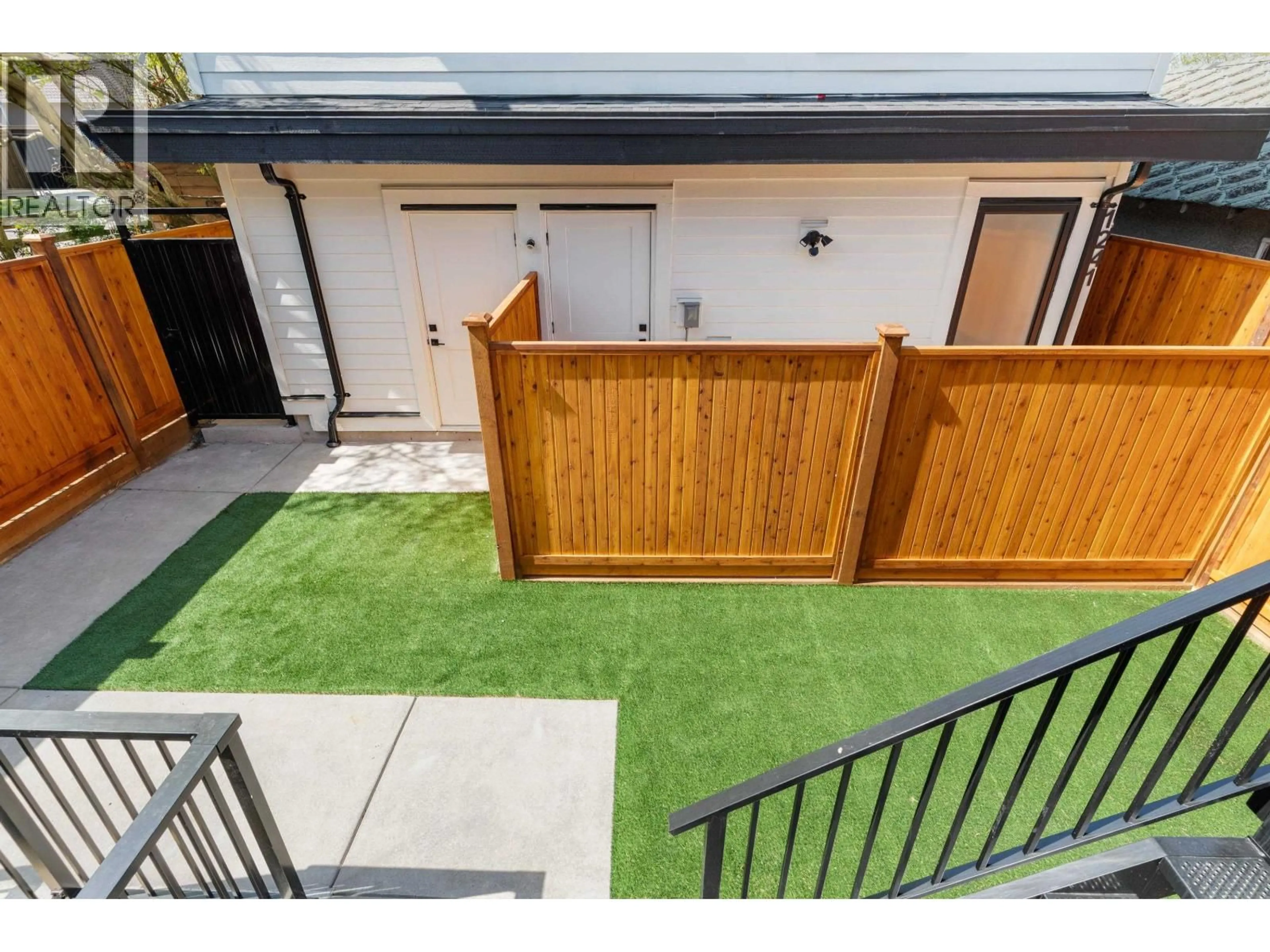 A pic from outside/outdoor area/front of a property/back of a property/a pic from drone, street for 2 - 1243 NOOTKA STREET, Vancouver British Columbia V5K4E6