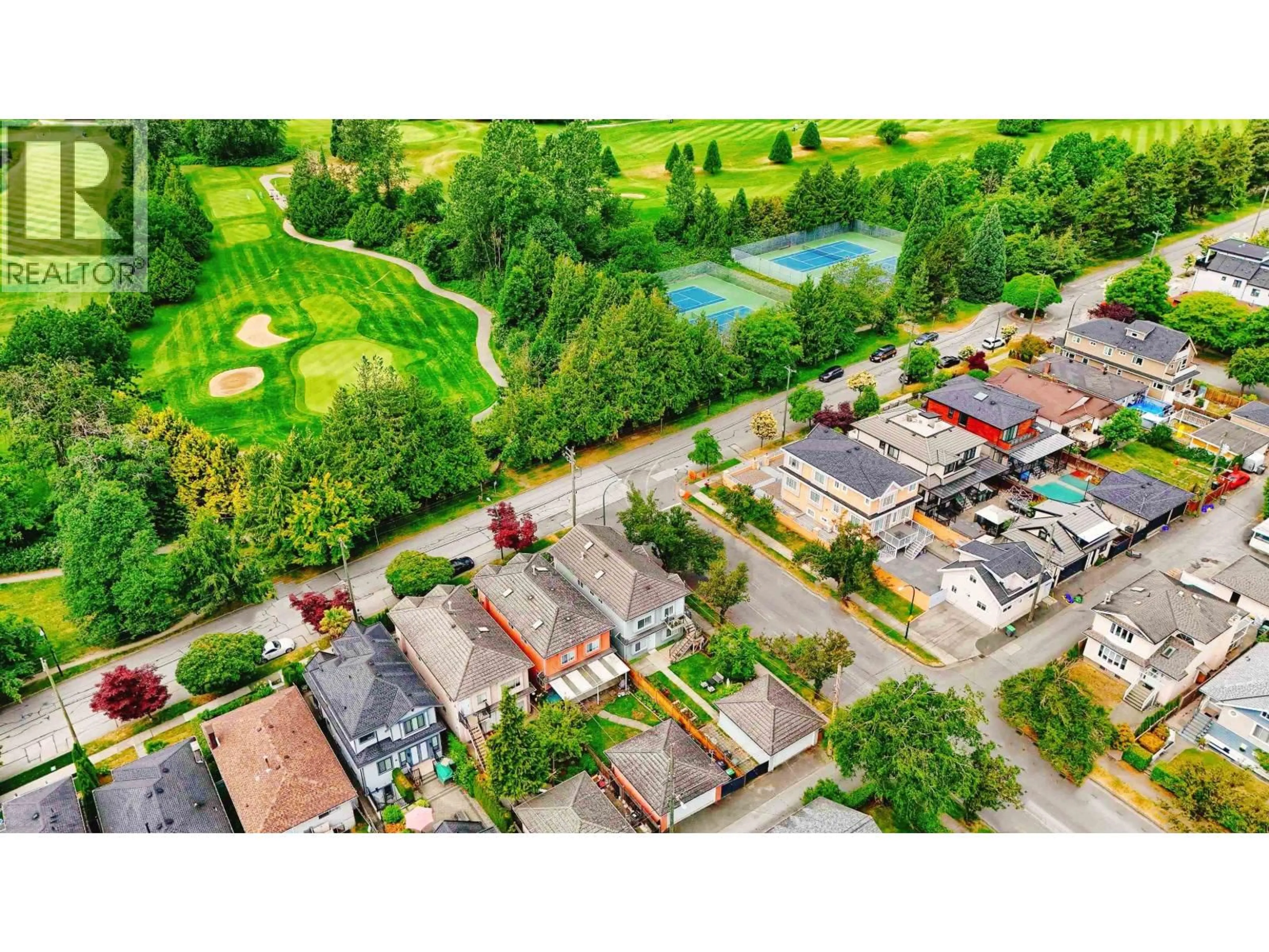 A pic from outside/outdoor area/front of a property/back of a property/a pic from drone, street for 75 56TH AVENUE, Vancouver British Columbia V5X1P7