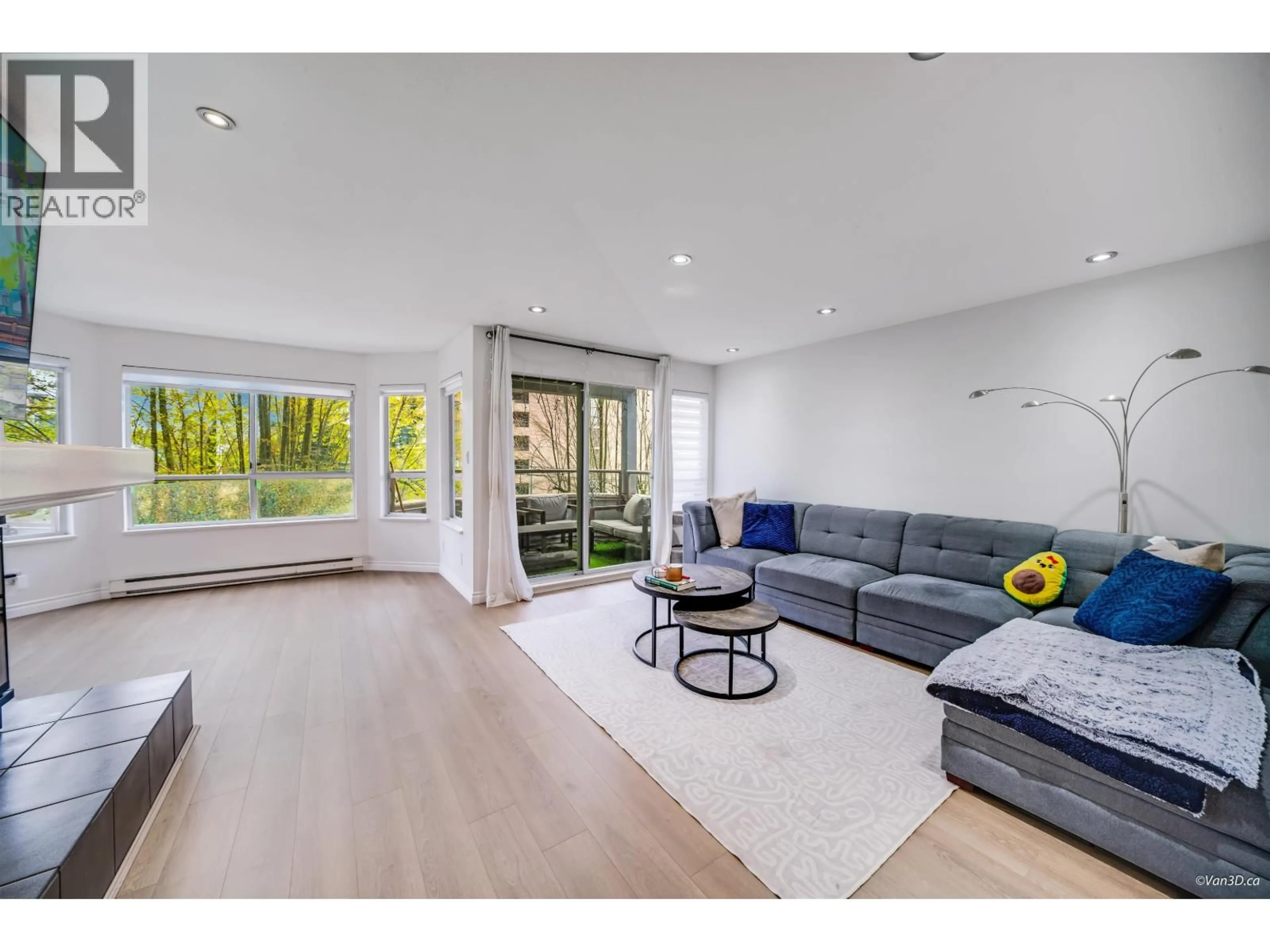 Living room with furniture, wood/laminate floor for 301 - 525 AUSTIN AVENUE, Coquitlam British Columbia V3K3M6